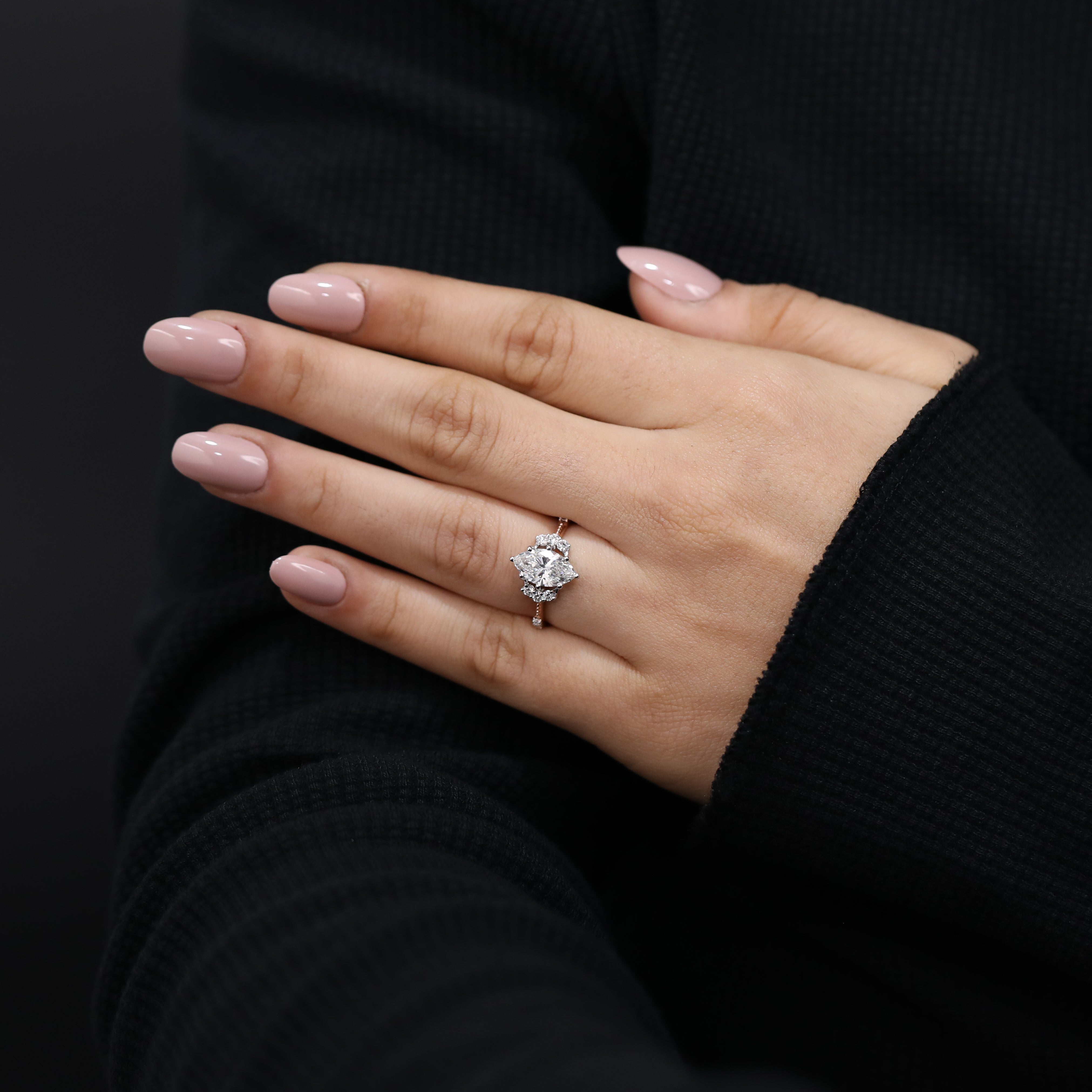 Statement engagement ring highlighting marquise lab created diamond