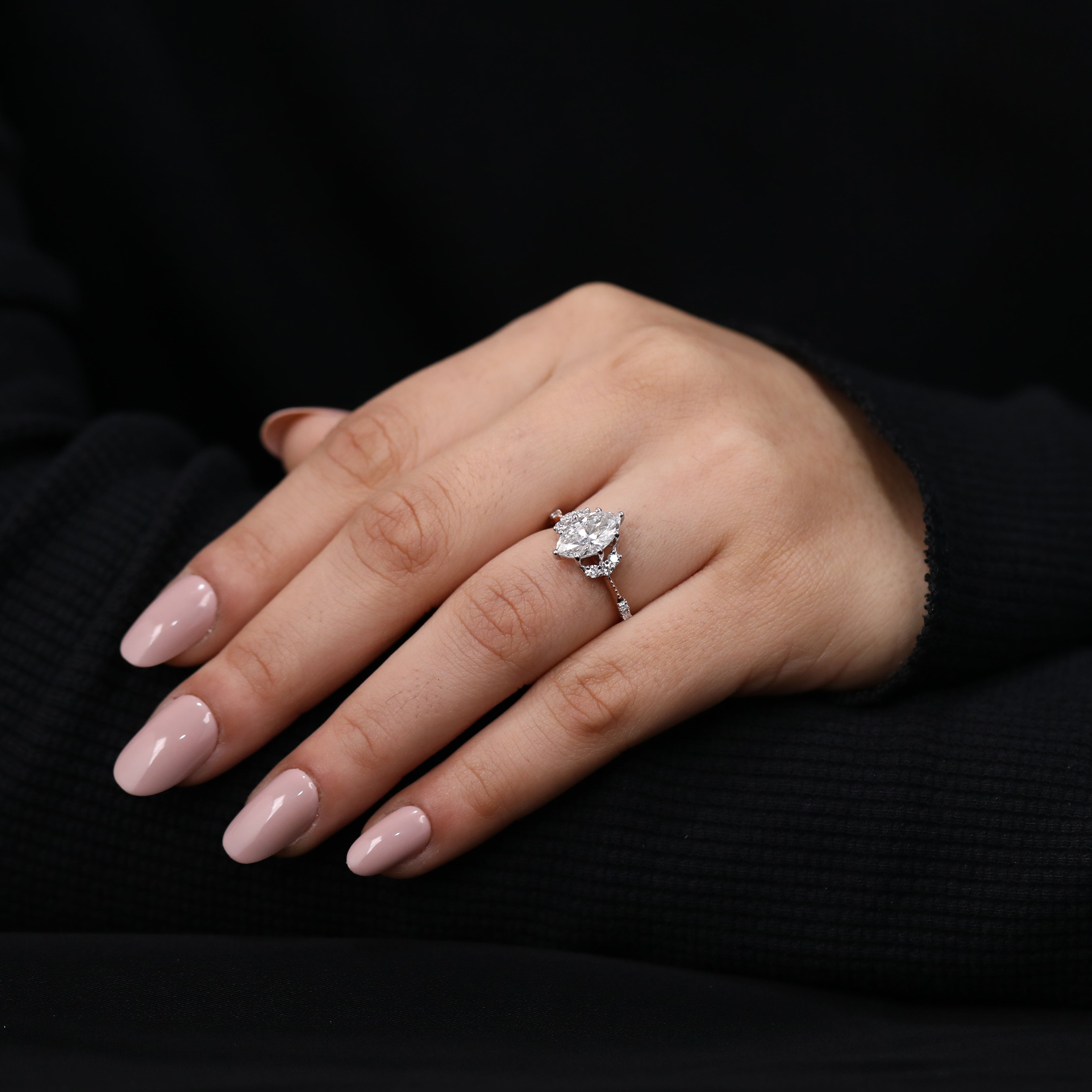 Art deco engagement ring featuring marquise lab created diamond