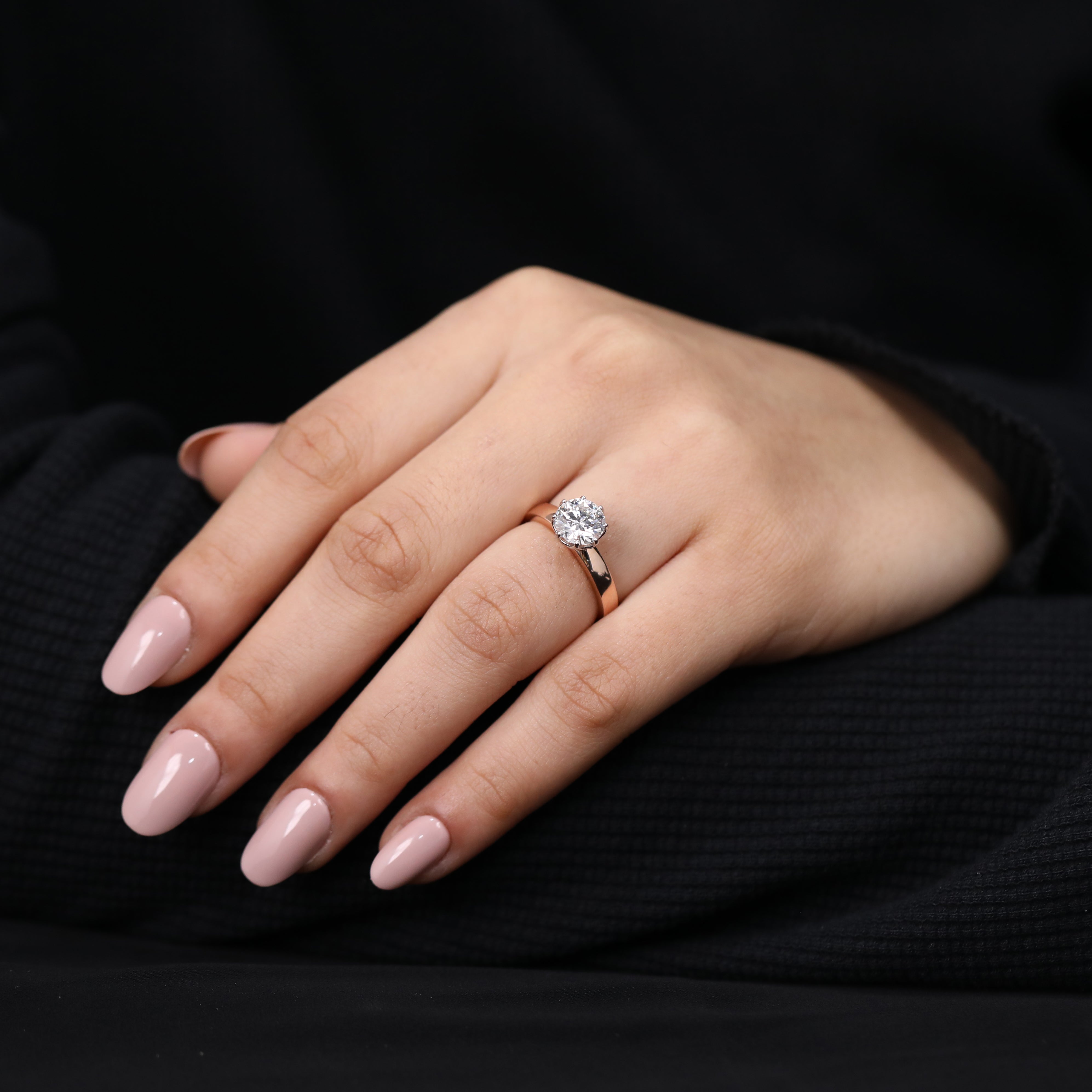 Romantic engagement ring featuring round lab grown diamond