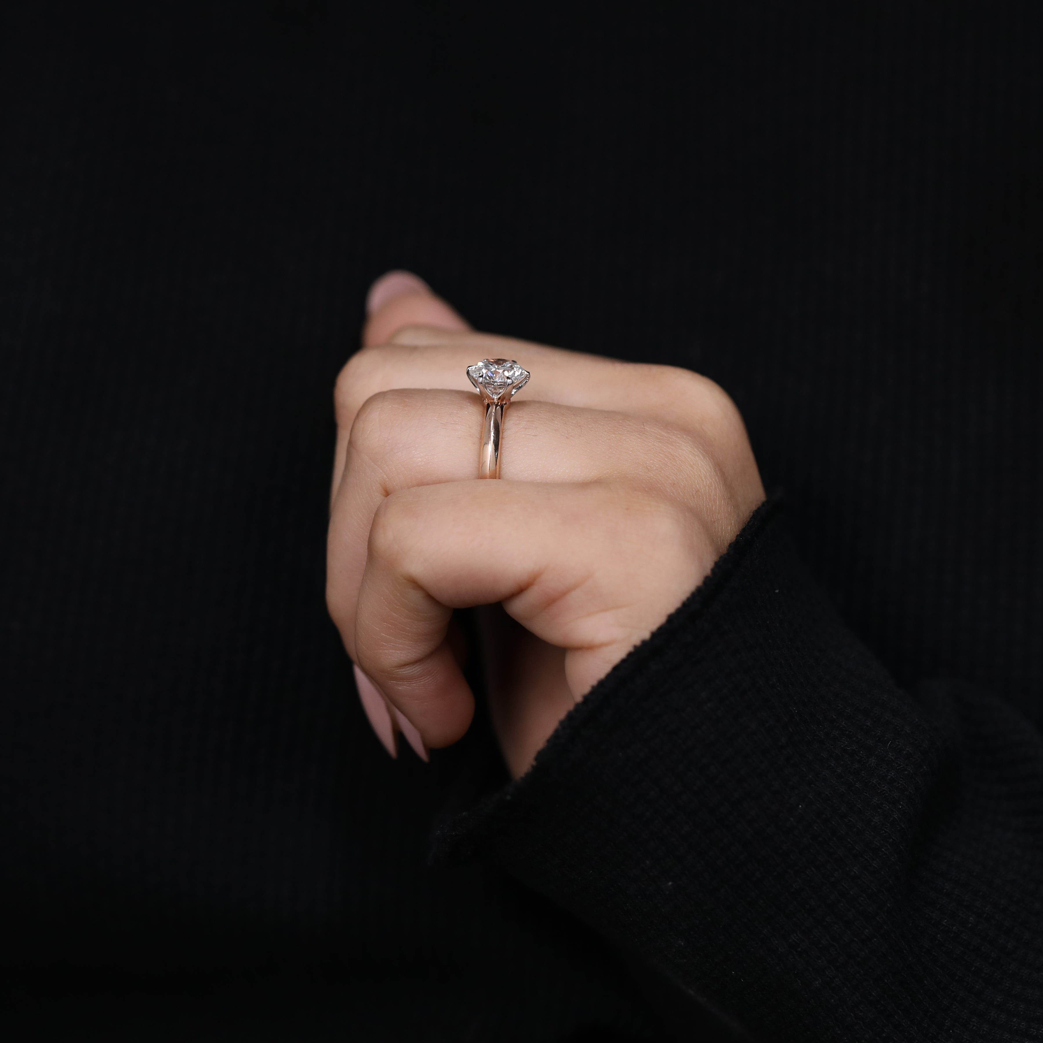 Fine jewelry engagement ring highlighting round lab created diamond
