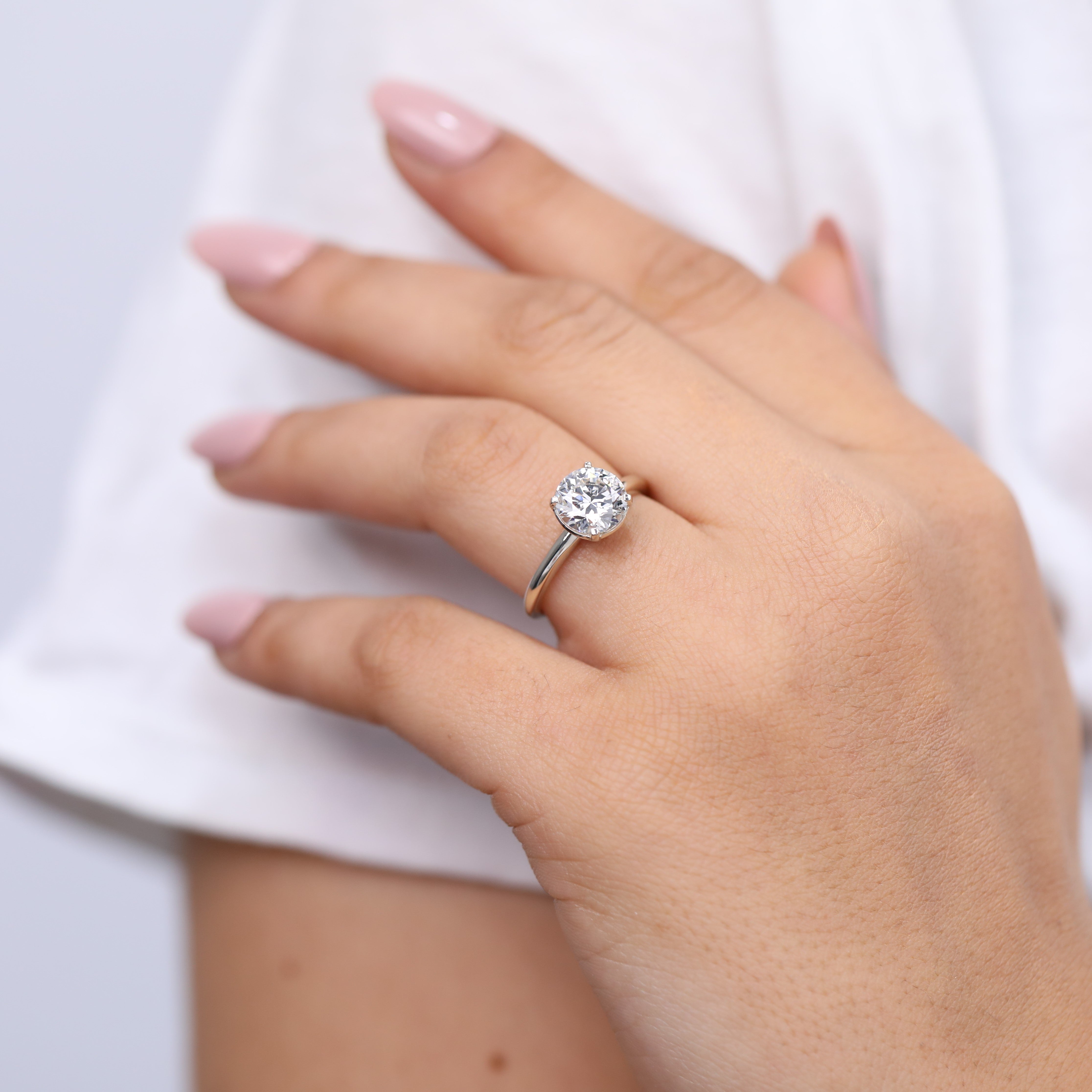 Sophisticated round lab grown diamond ring in a refined solitaire style