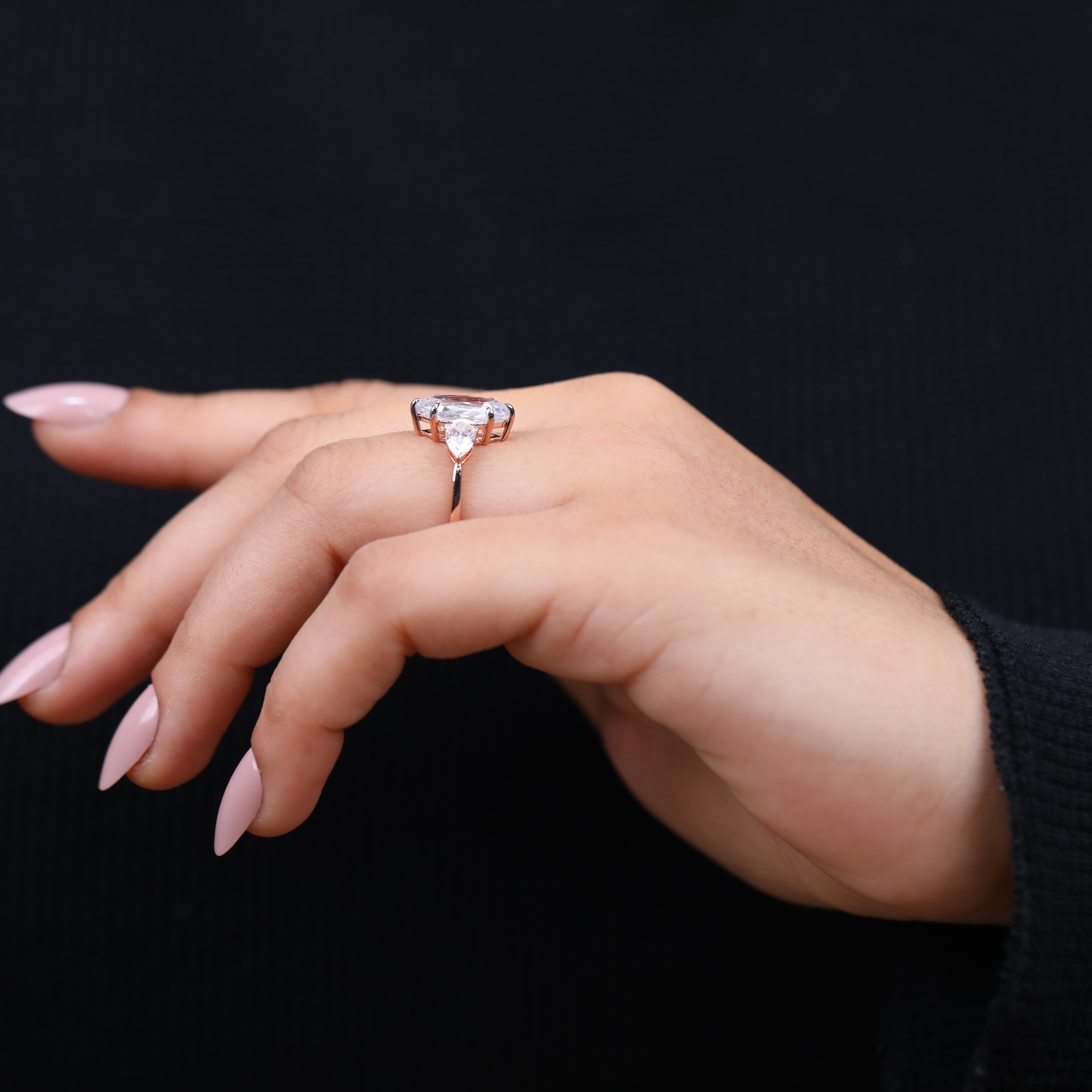 Marquise shaped engagement ring with pear side stones for special occasions