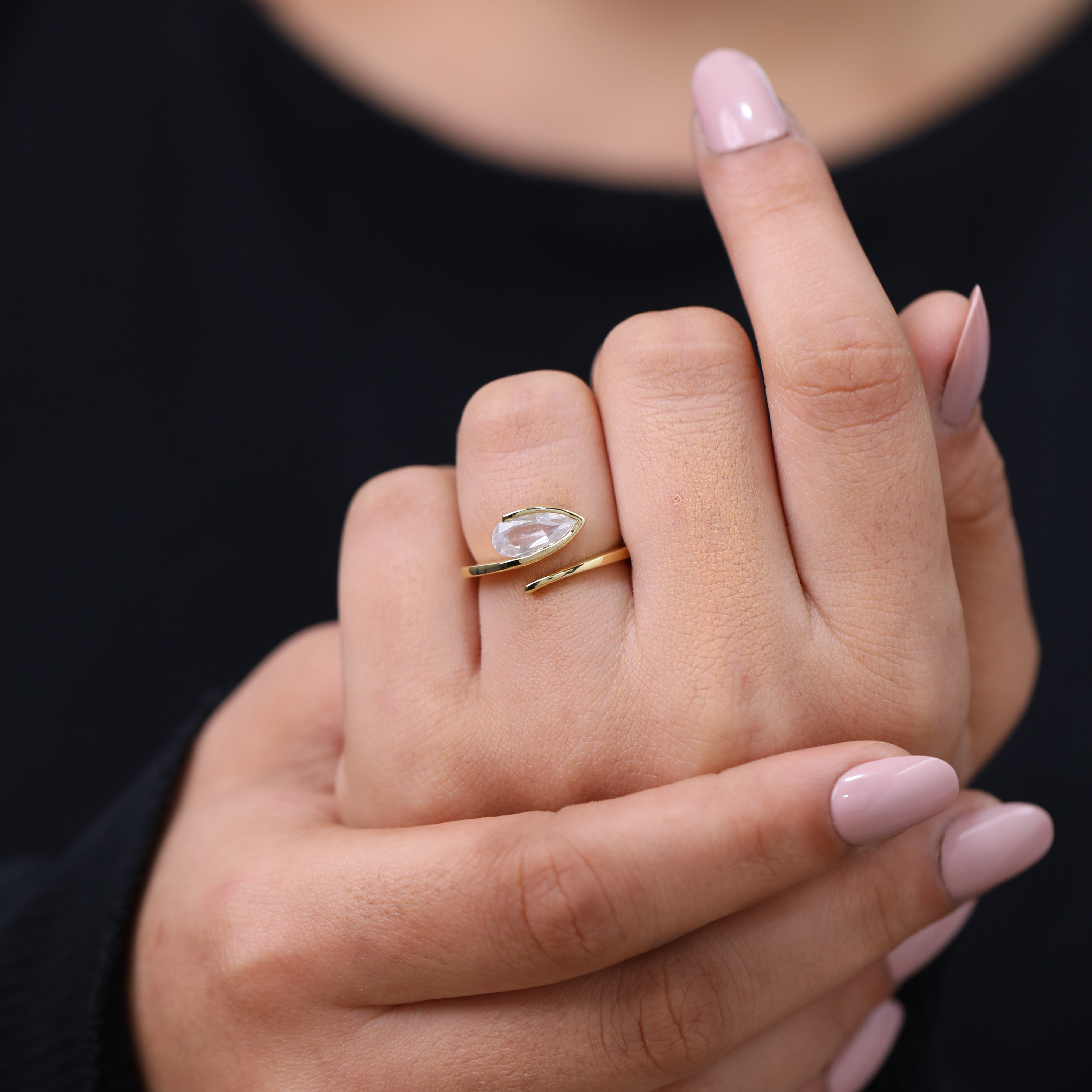 Bypass design solitaire ring featuring marquise lab grown diamond