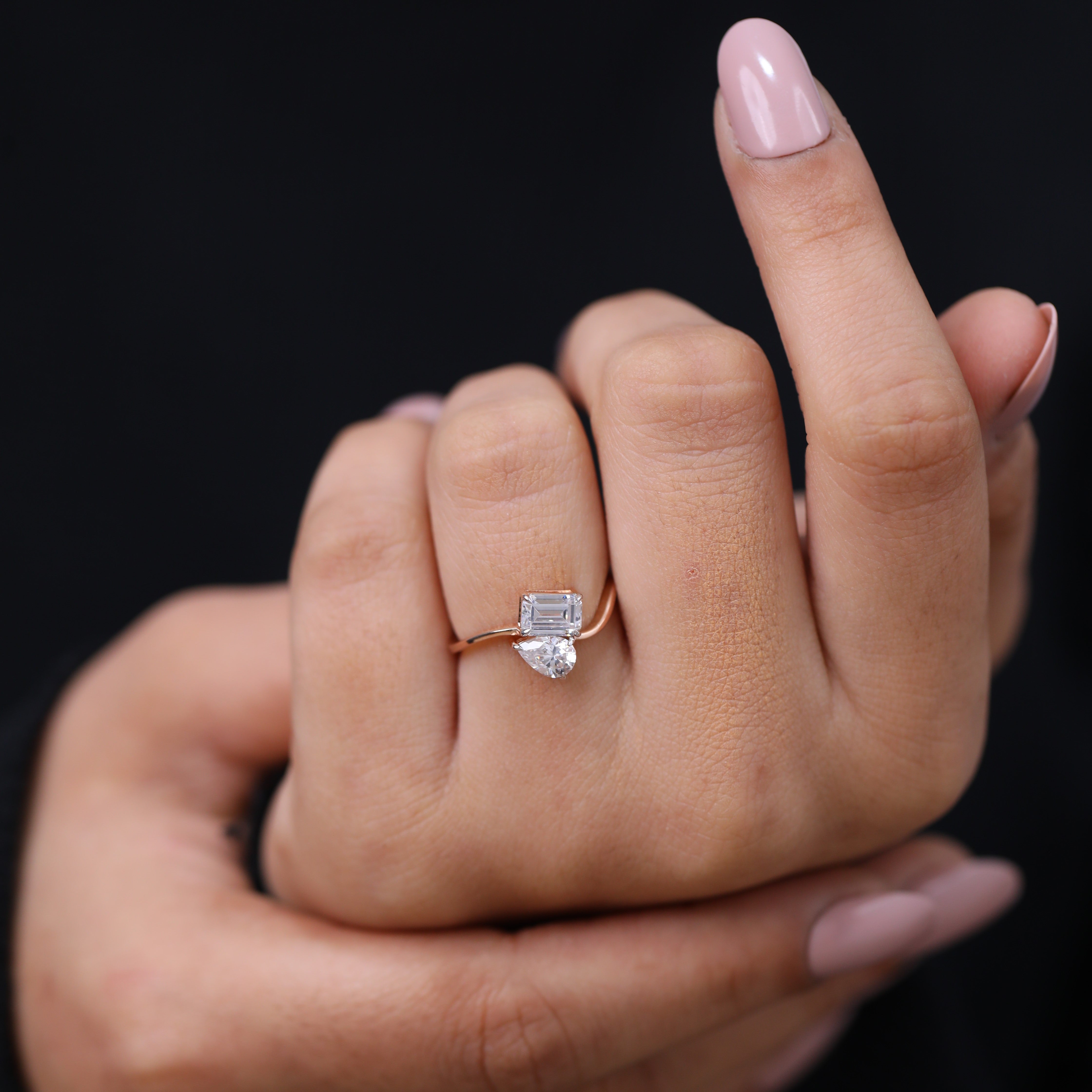 Pear shaped and emerald cut diamond toi et moi engagement ring