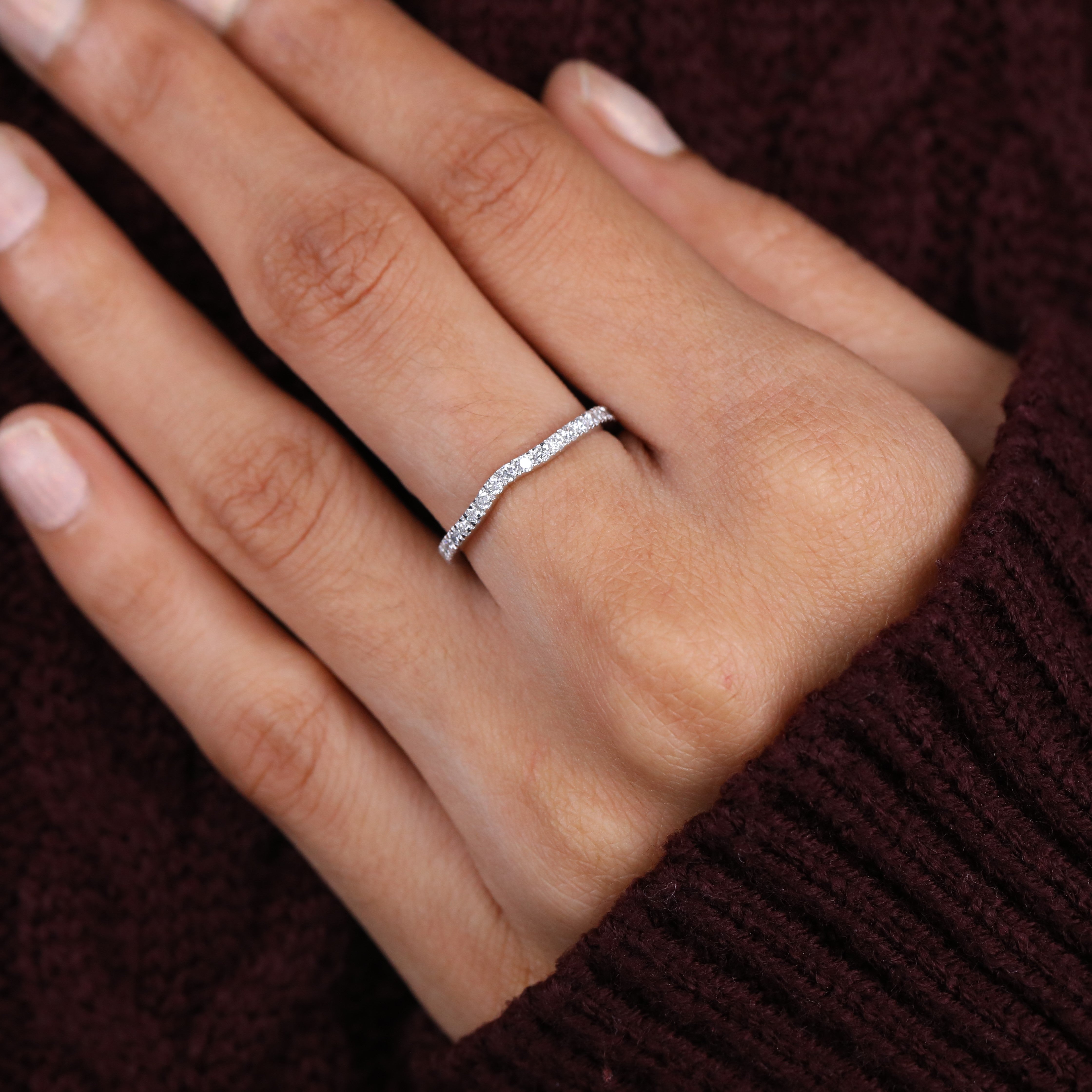 Slim diamond wedding band designed for everyday elegance and sparkle.