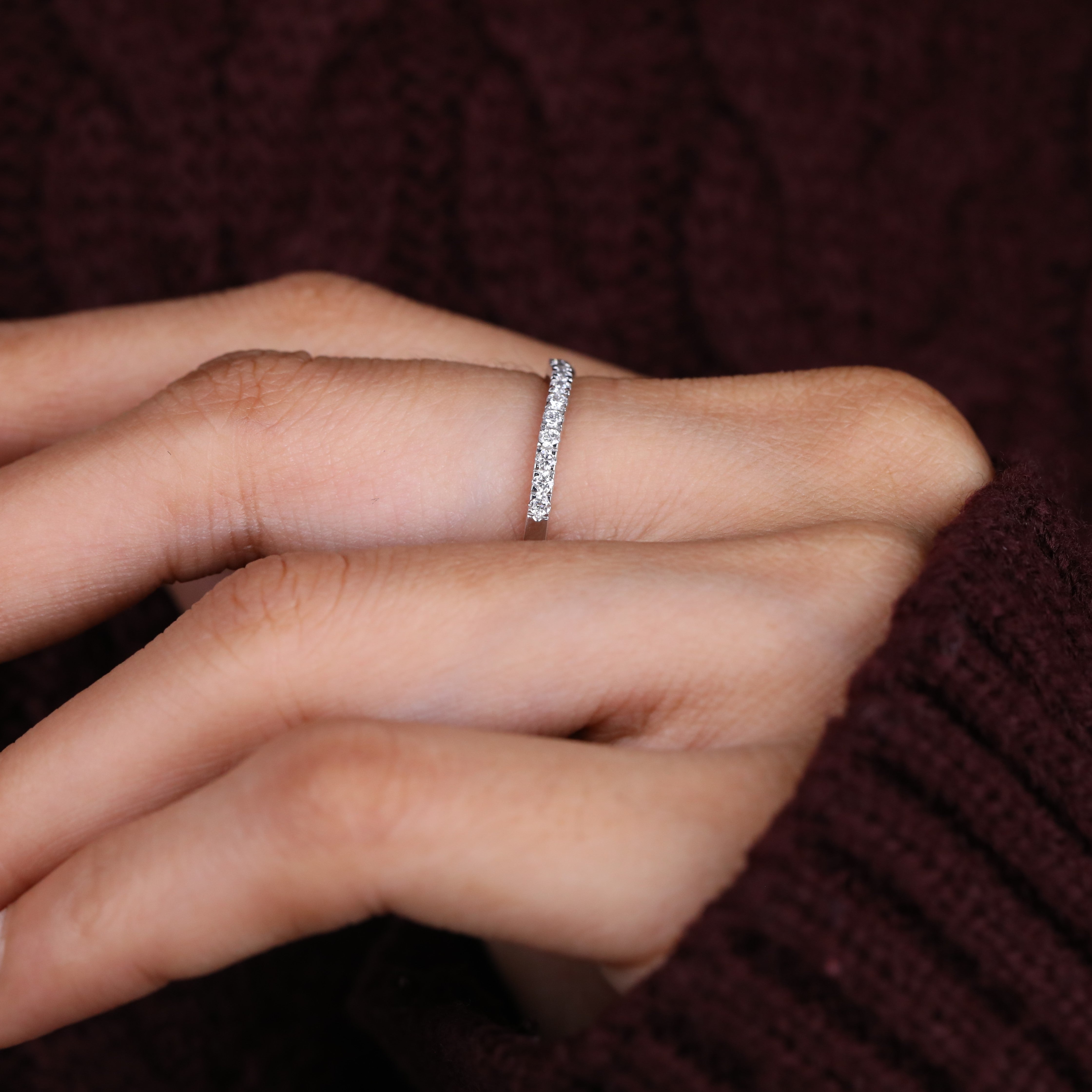 Thin diamond band ring offering subtle sparkle for daily luxury style