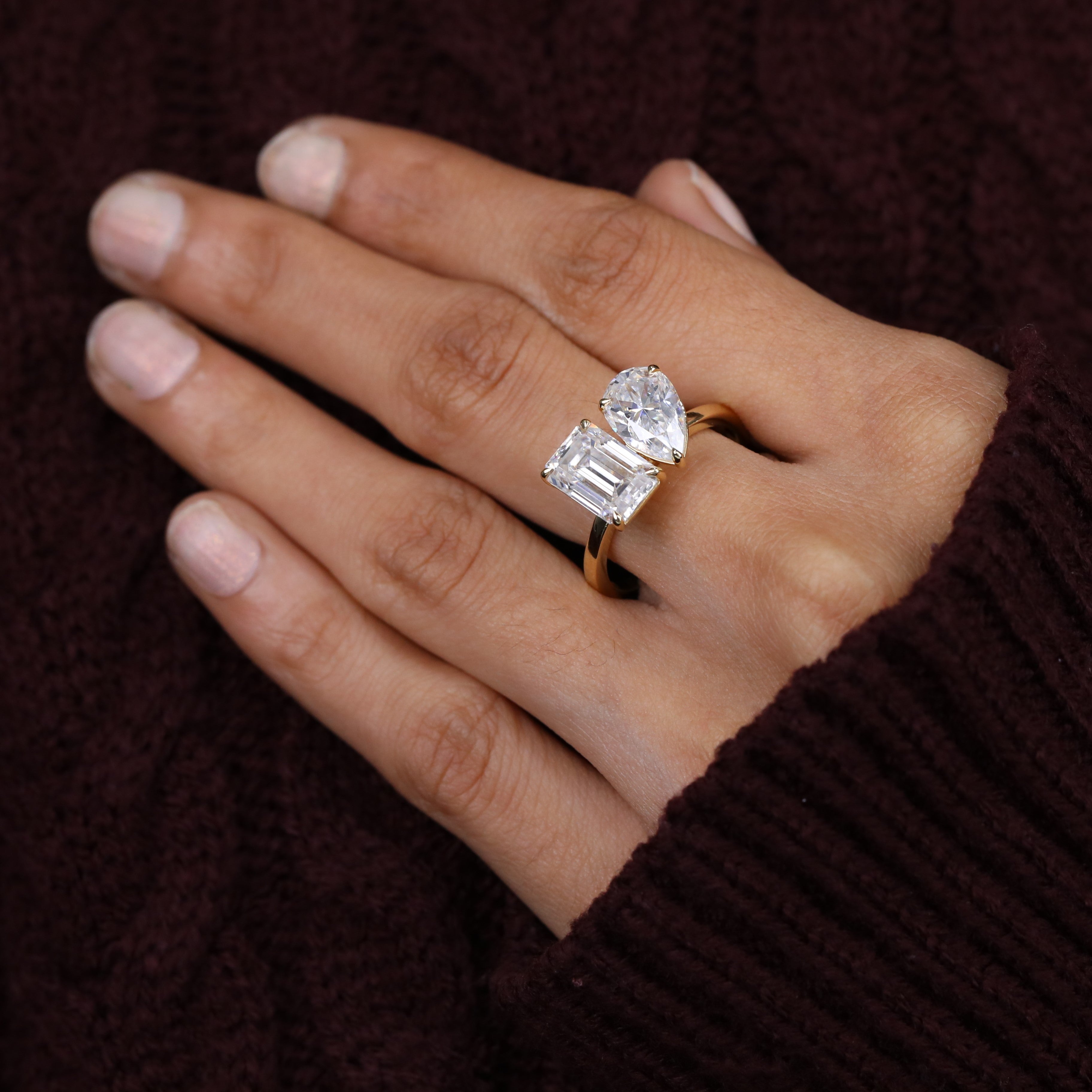 Two stone toi et moi ring crafted with lab grown pear and emerald cuts