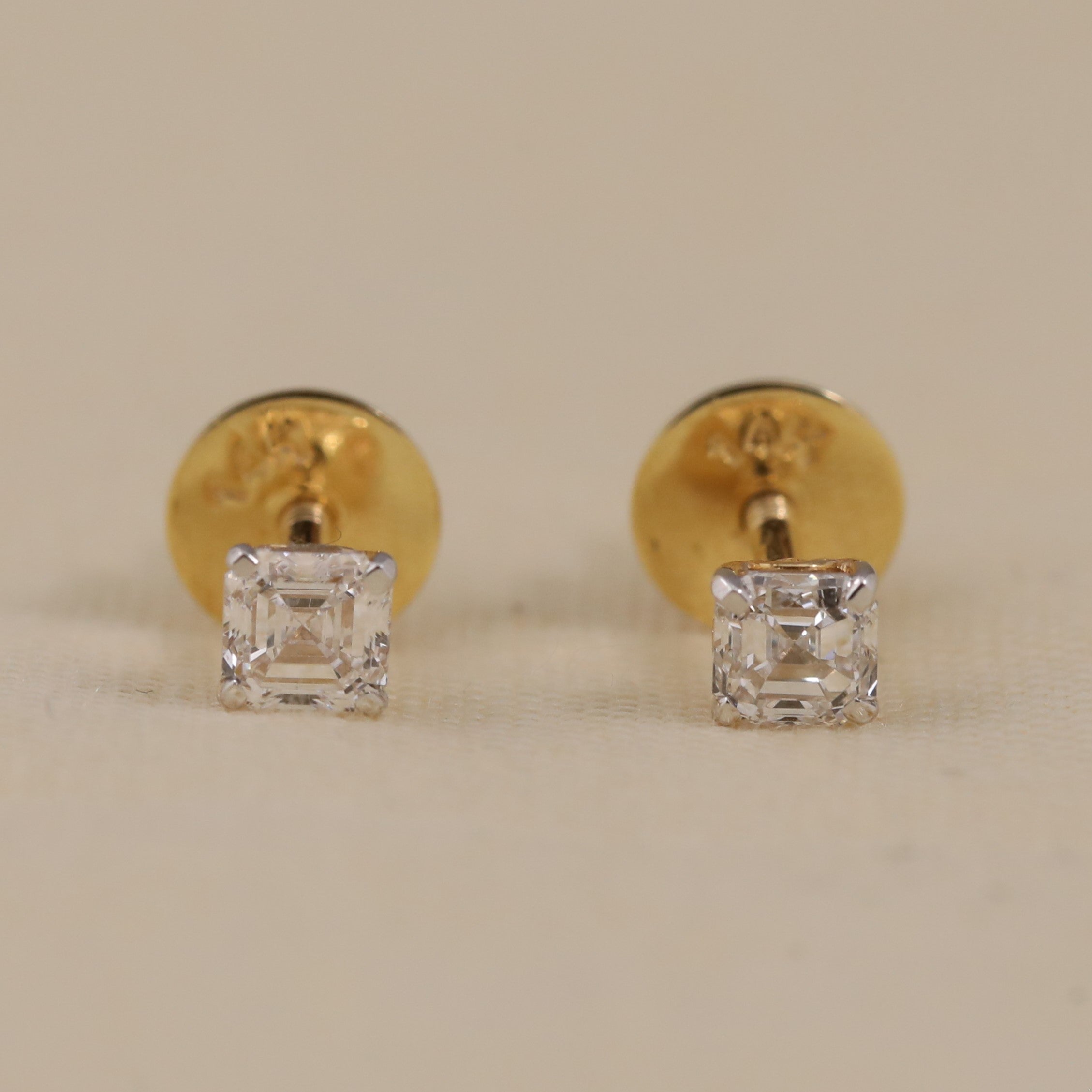 Stylish Asscher-cut diamond stud earrings ideal for party wear and celebrations