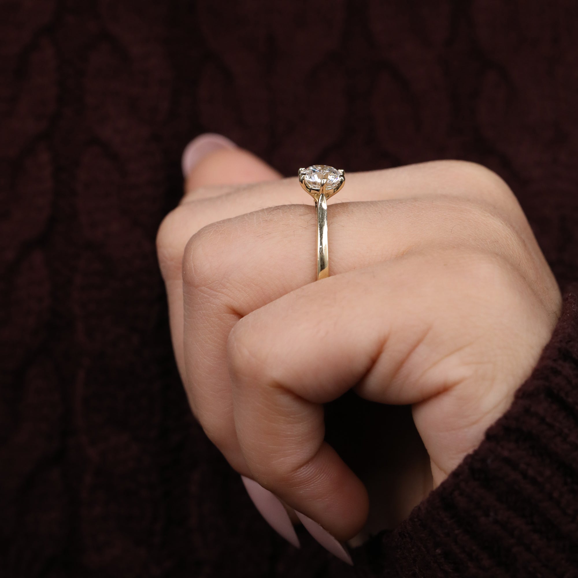 Six prong solitaire engagement ring with a brilliant round lab grown diamond