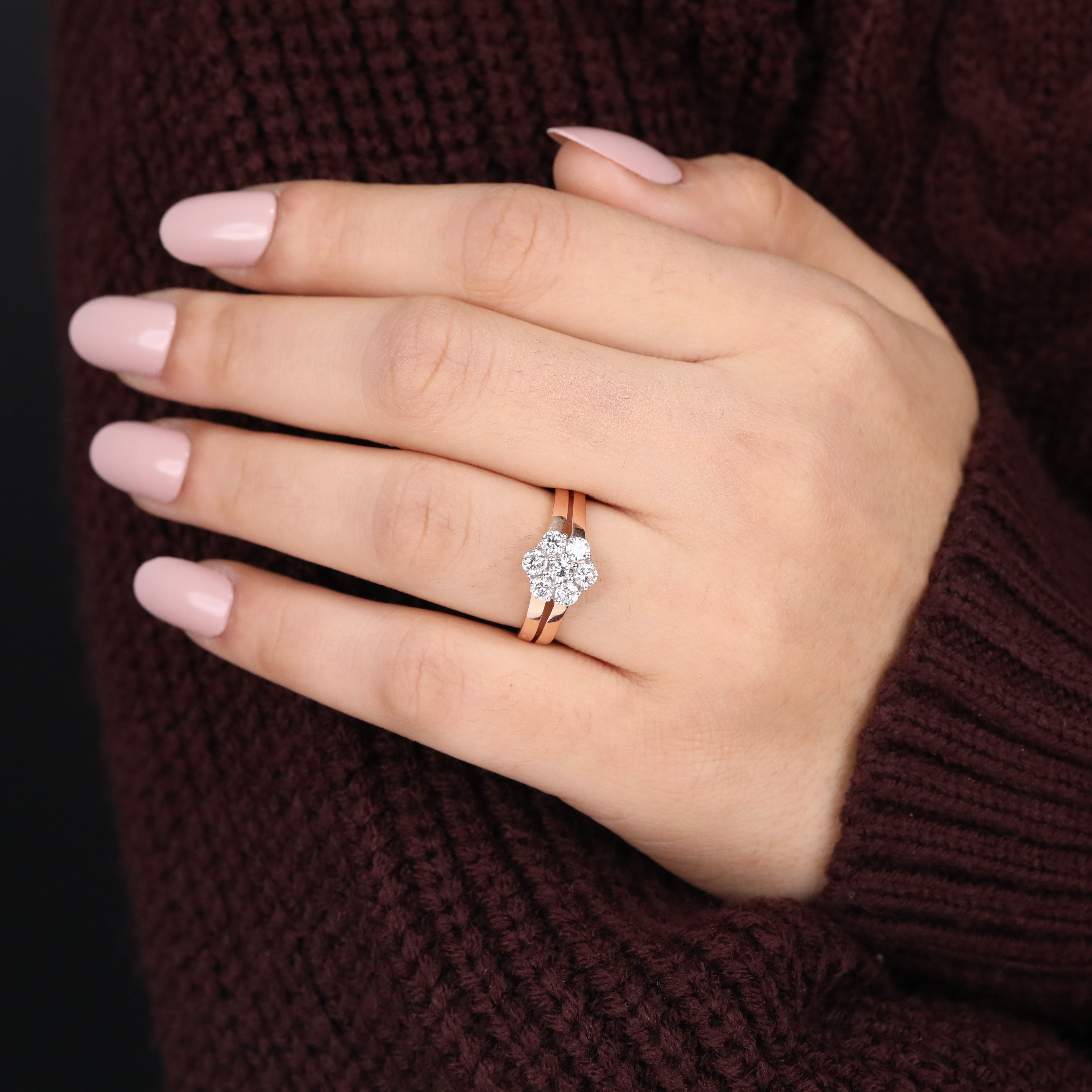 Floral-inspired lab-grown diamond ring highlighted by its elegant double shank