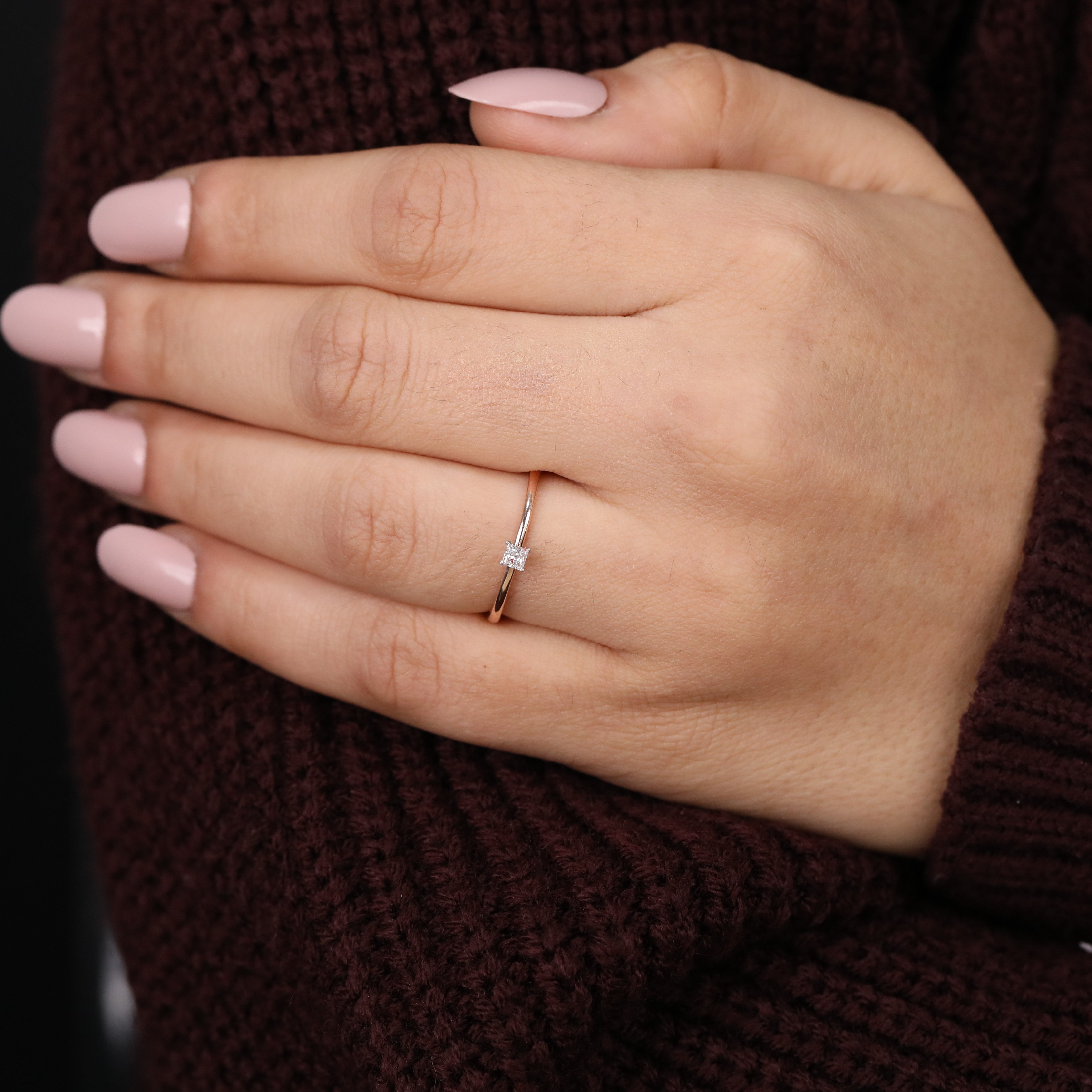 Thin band ring showcasing a subtle princess lab-grown diamond for promises