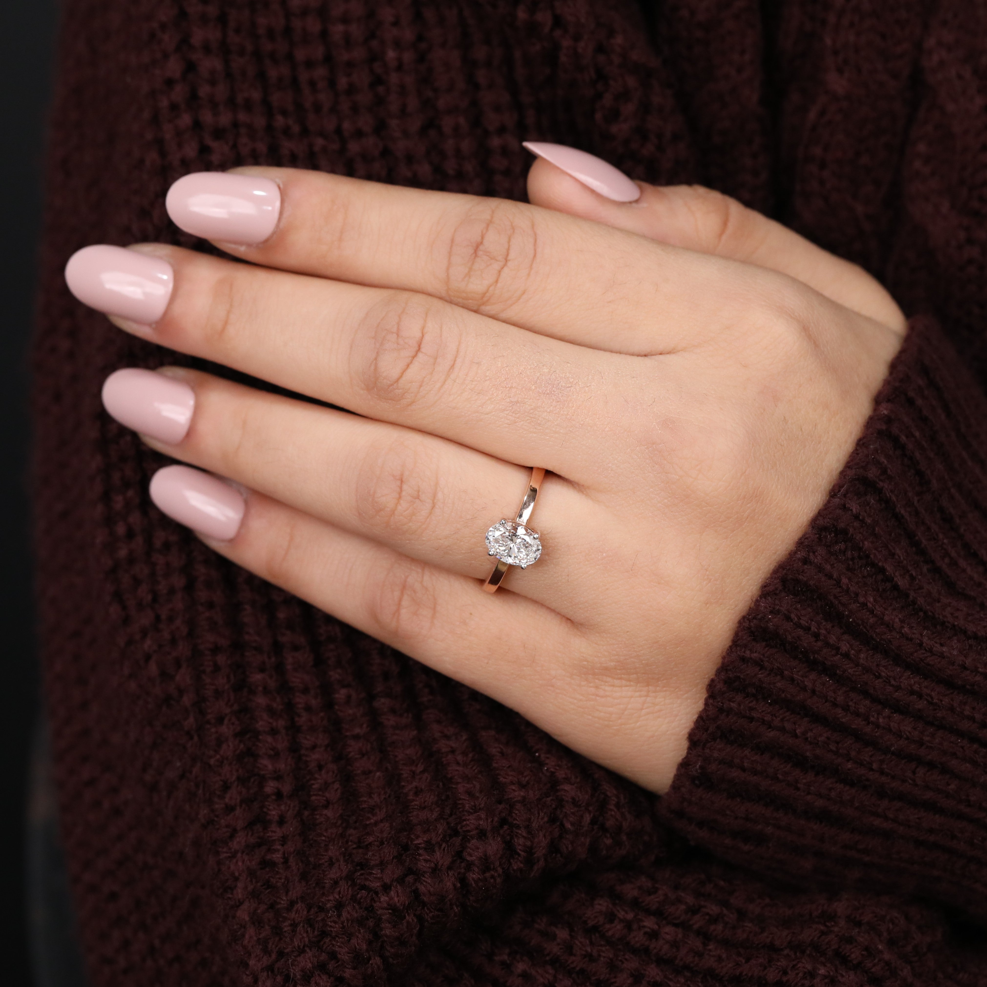 Beautiful oval solitaire ring featuring a sparkling lab grown diamond in prongs
