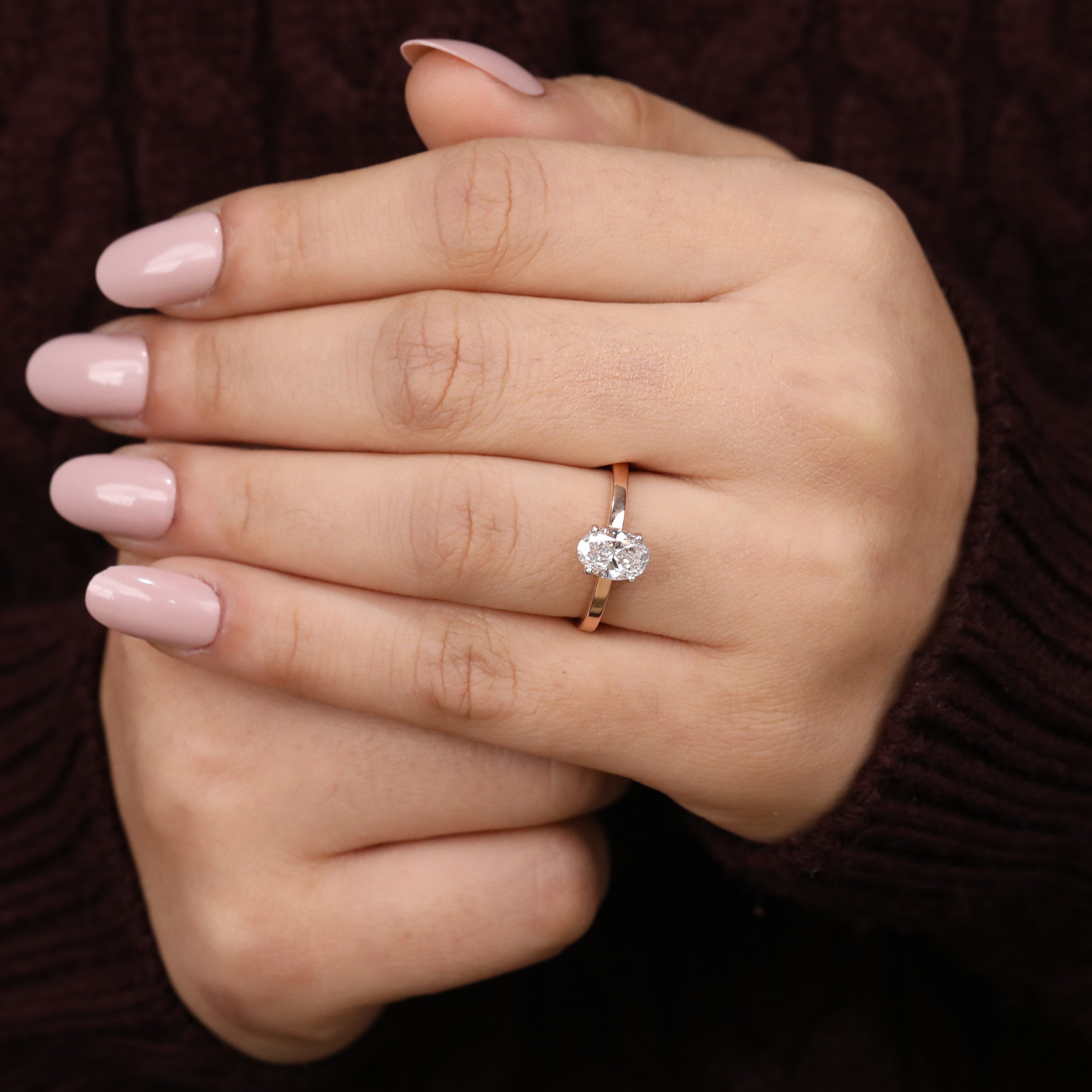 Modern oval lab grown diamond solitaire offering elegant simplicity and brilliance