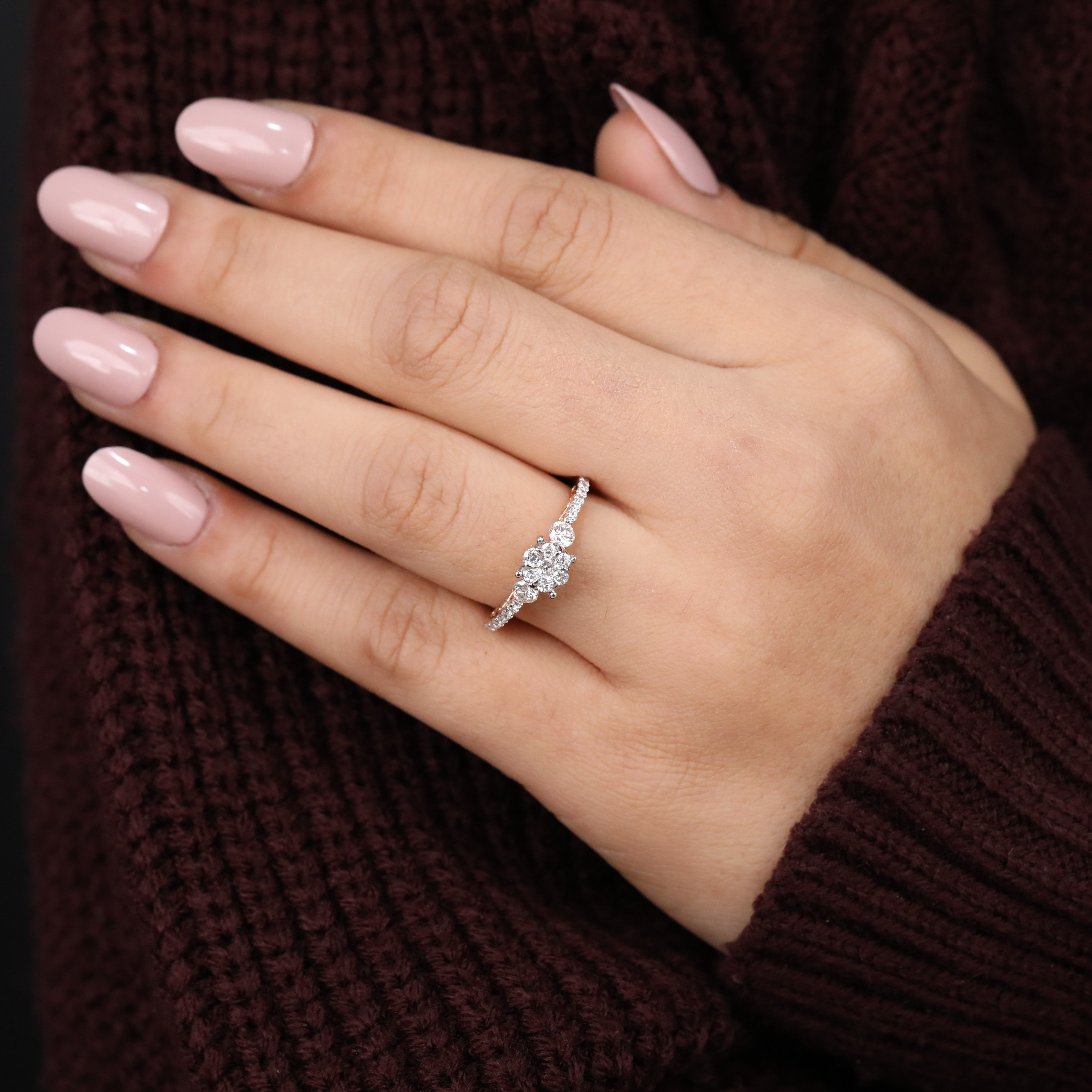 Rose gold lab-grown diamond cluster ring featuring bright side stones.