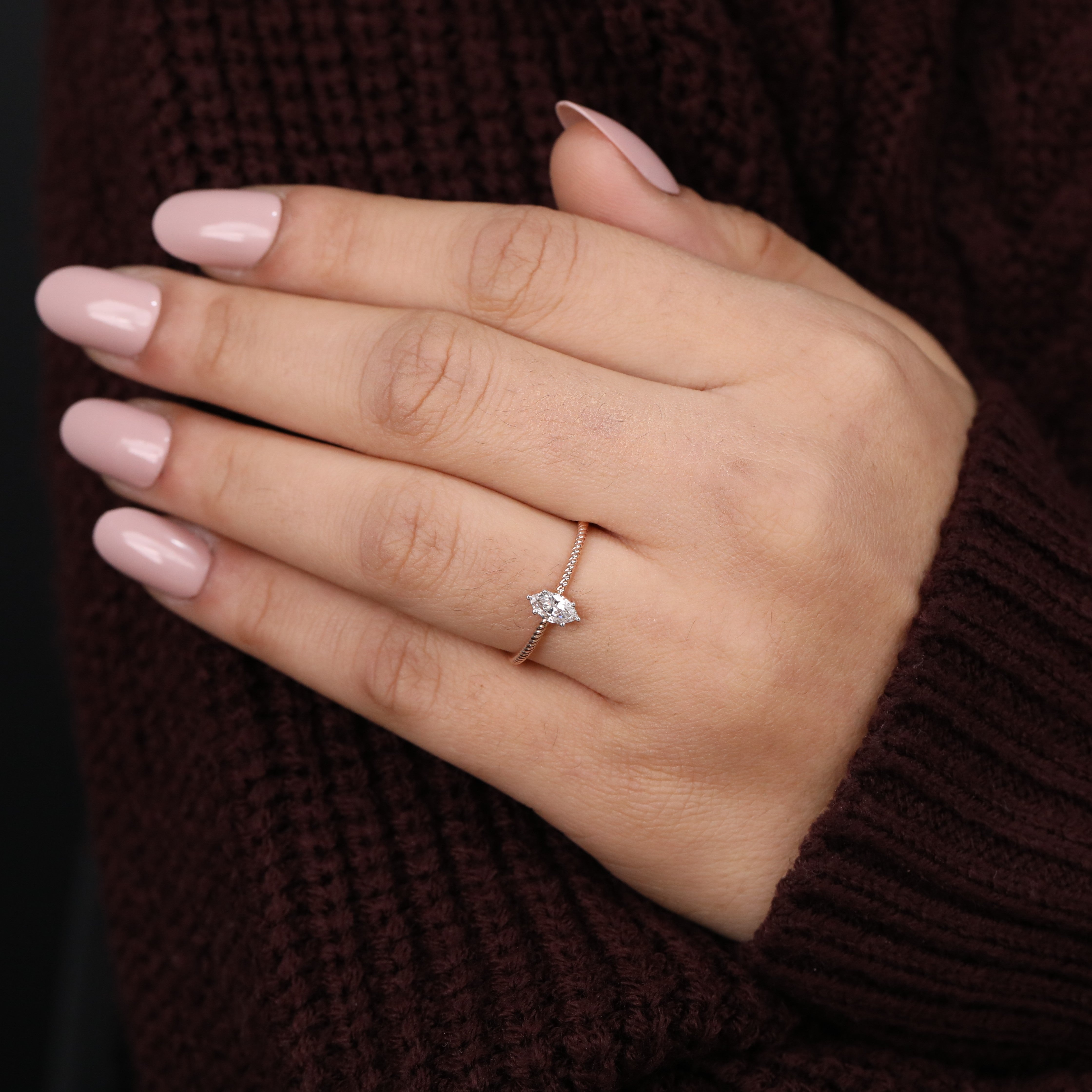 Beautiful marquise cut lab grown diamond ring with twisted shank for gifting
