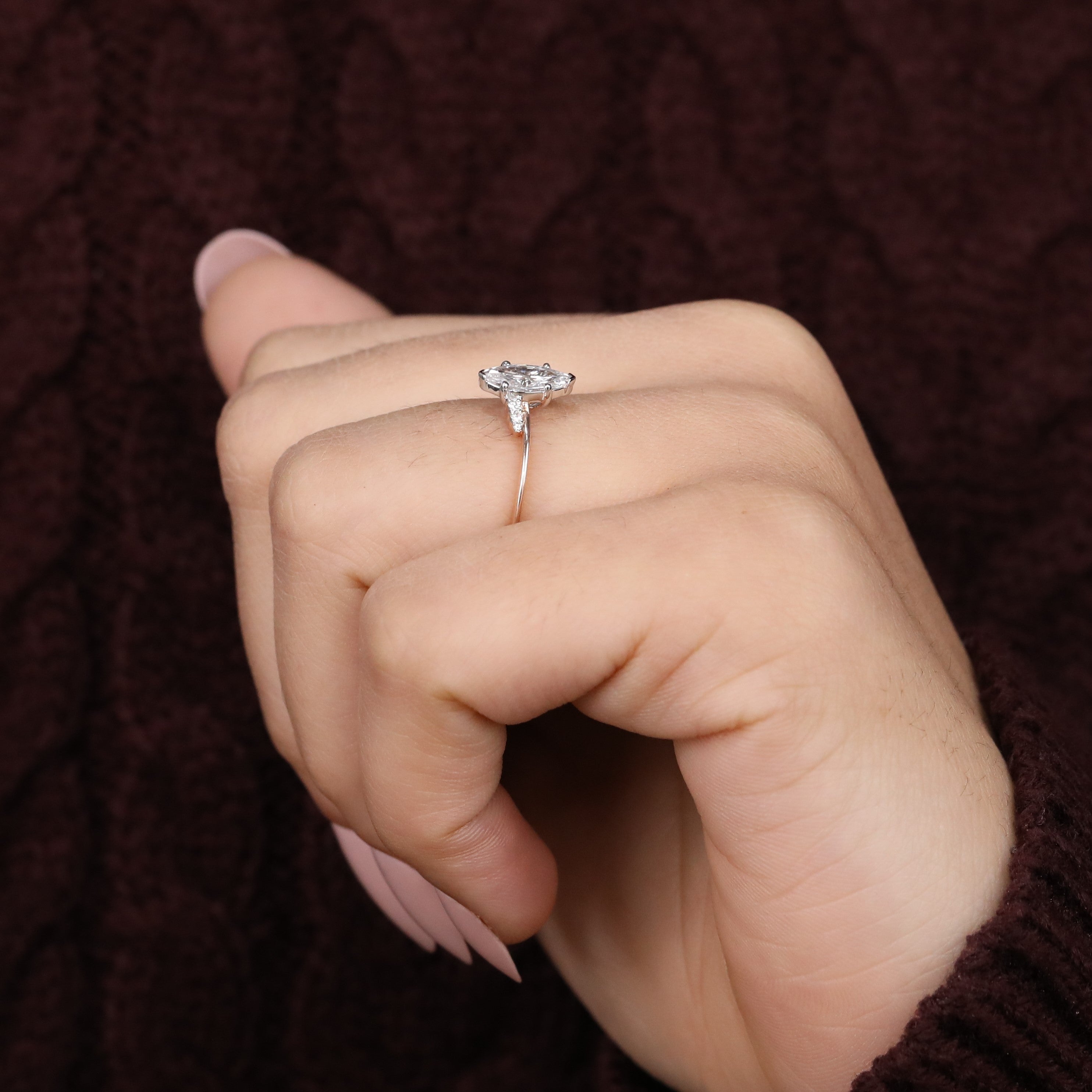 Beautiful marquise lab grown diamond ring crafted with subtle accent diamonds
