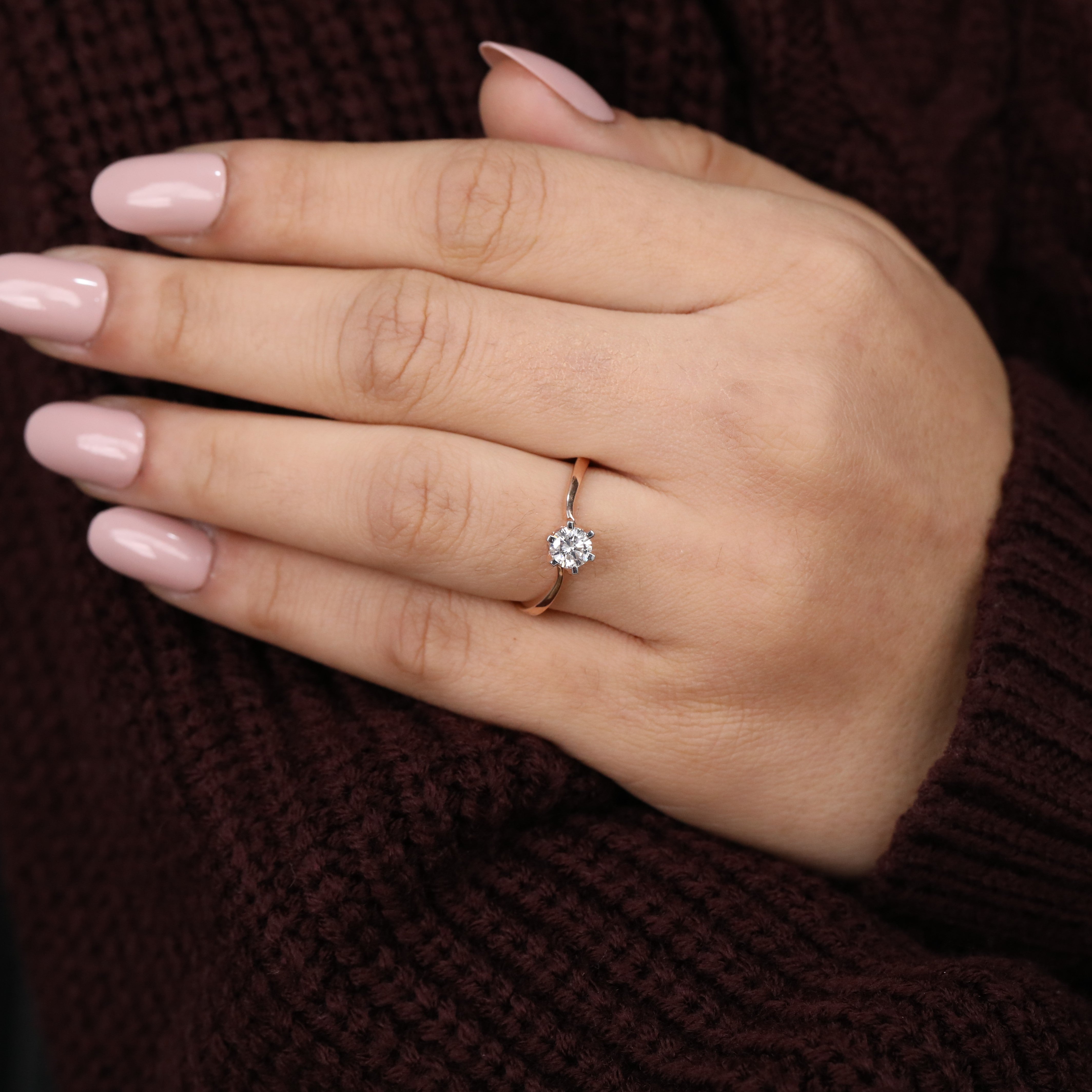 Simple solitaire design showcasing a brilliant round lab grown diamond center