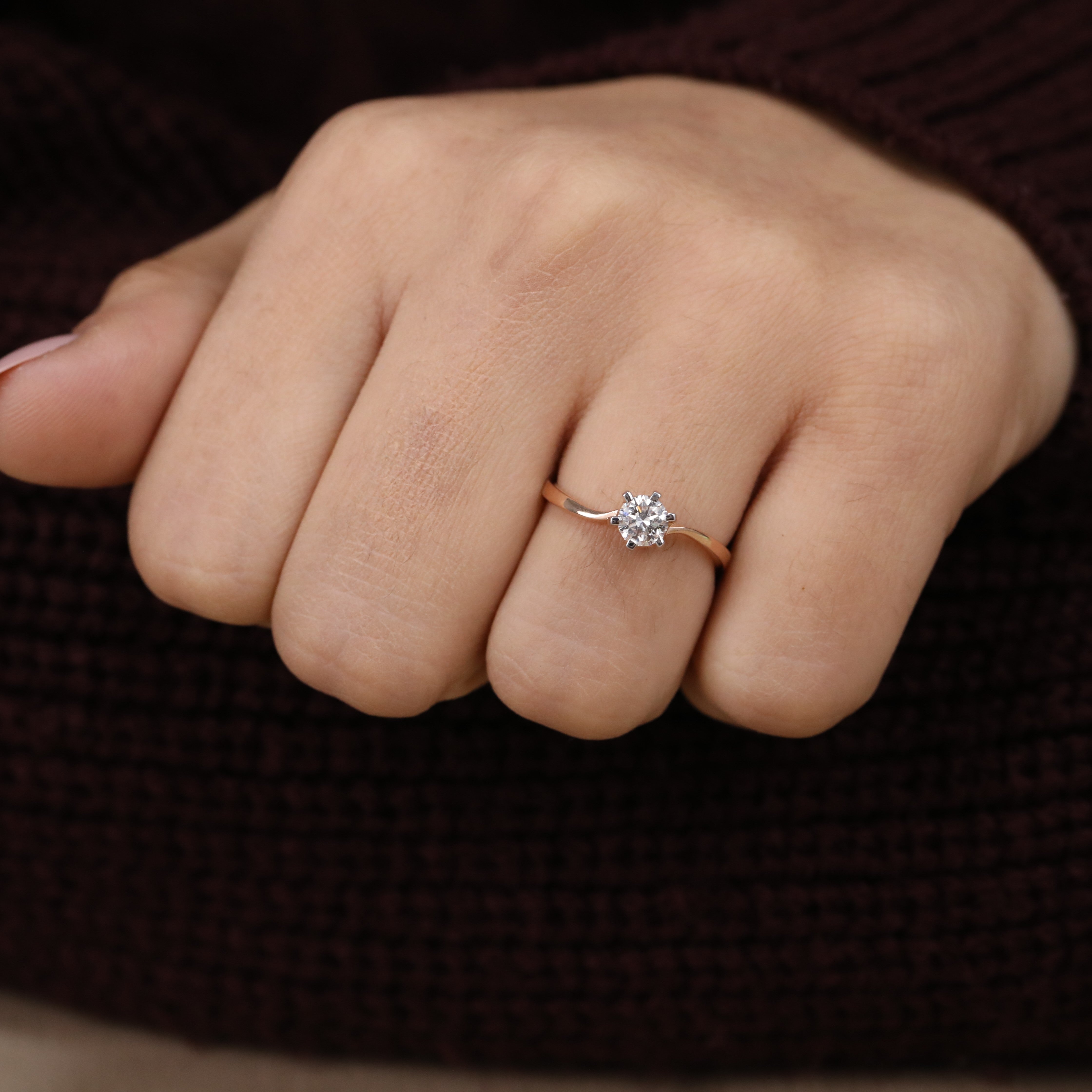 Stylish minimalist band ring with a bright round lab grown diamond