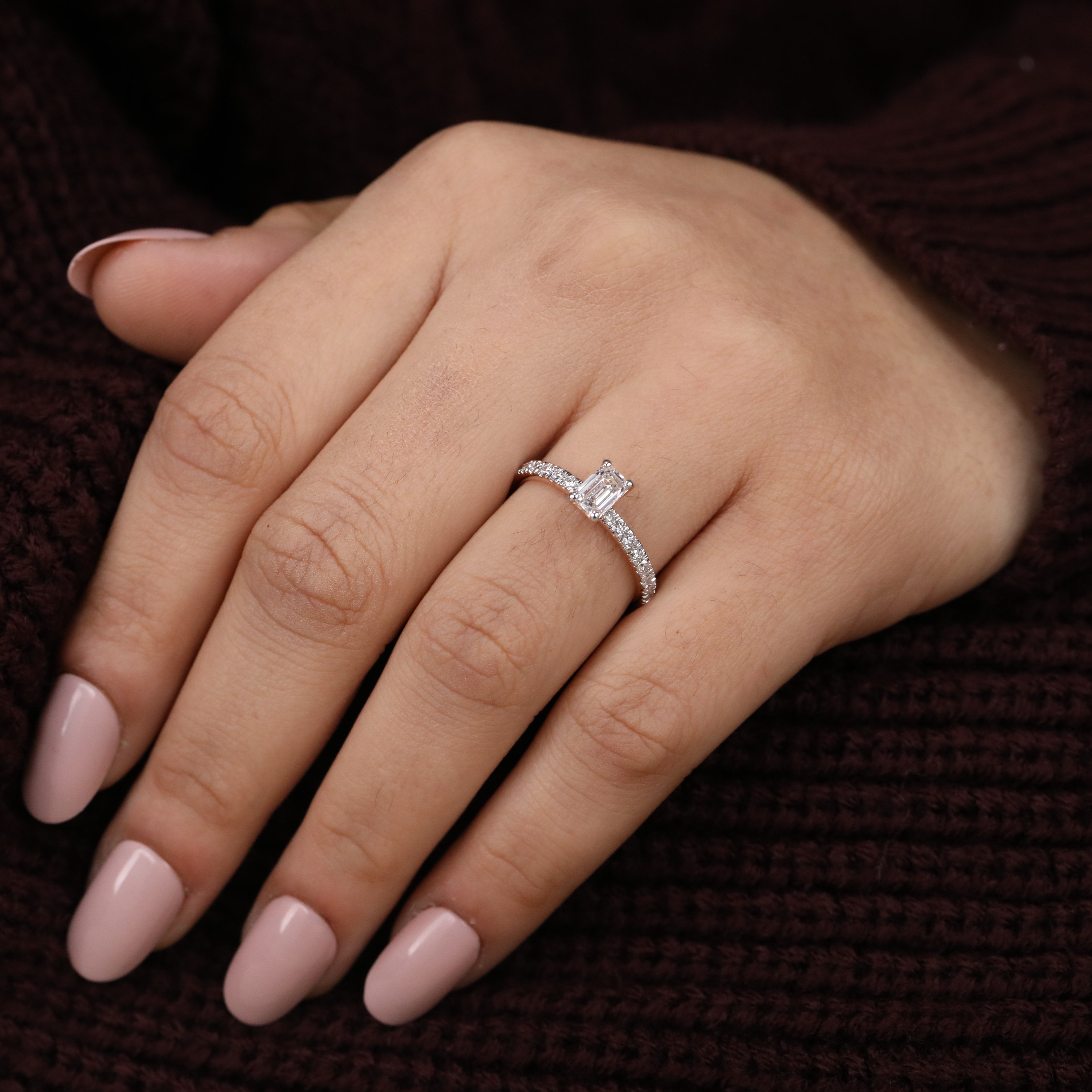 Classic emerald cut lab grown diamond ring designed with a slim pavé shank