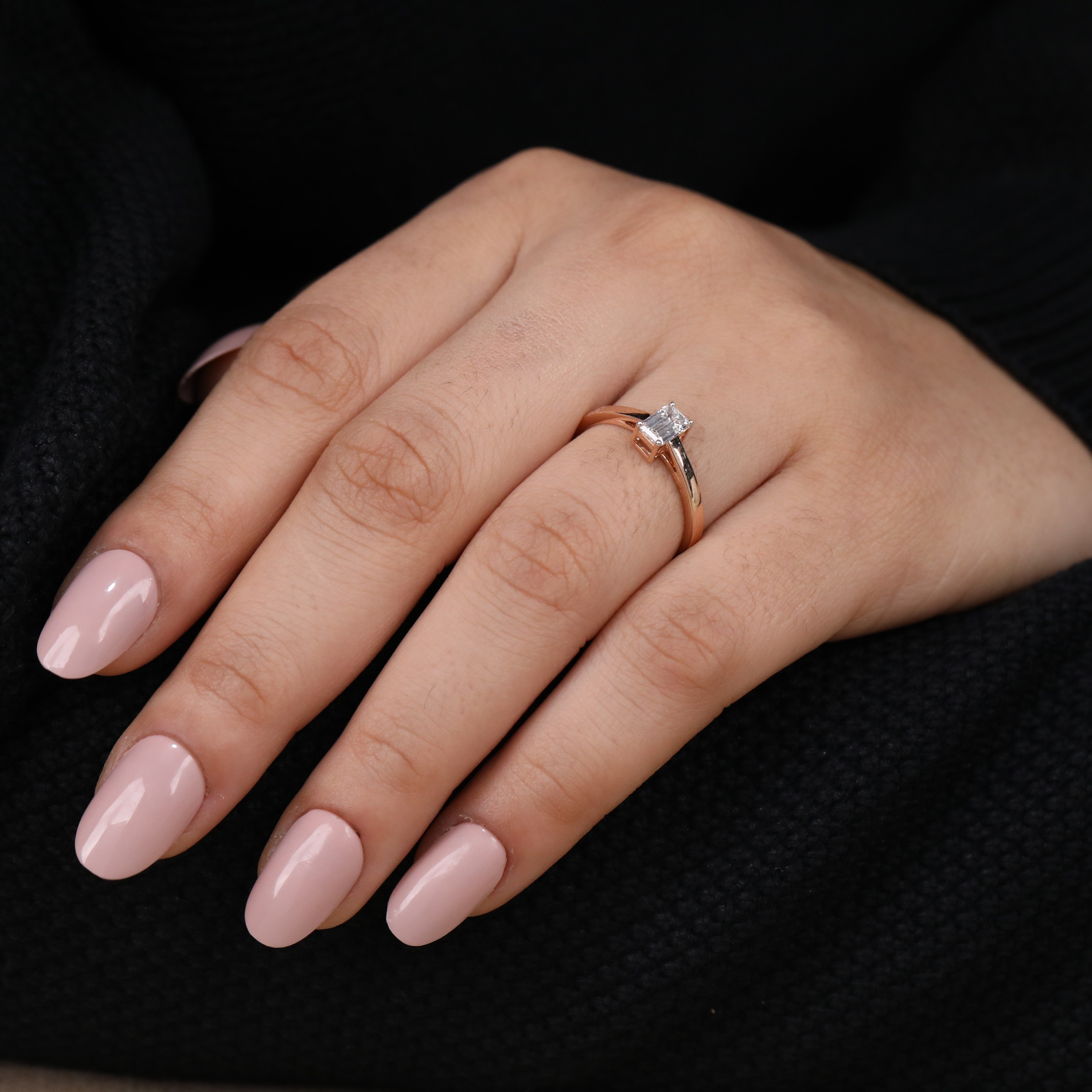 Modern emerald cut lab grown diamond solitaire offering elegant simplicity and shine