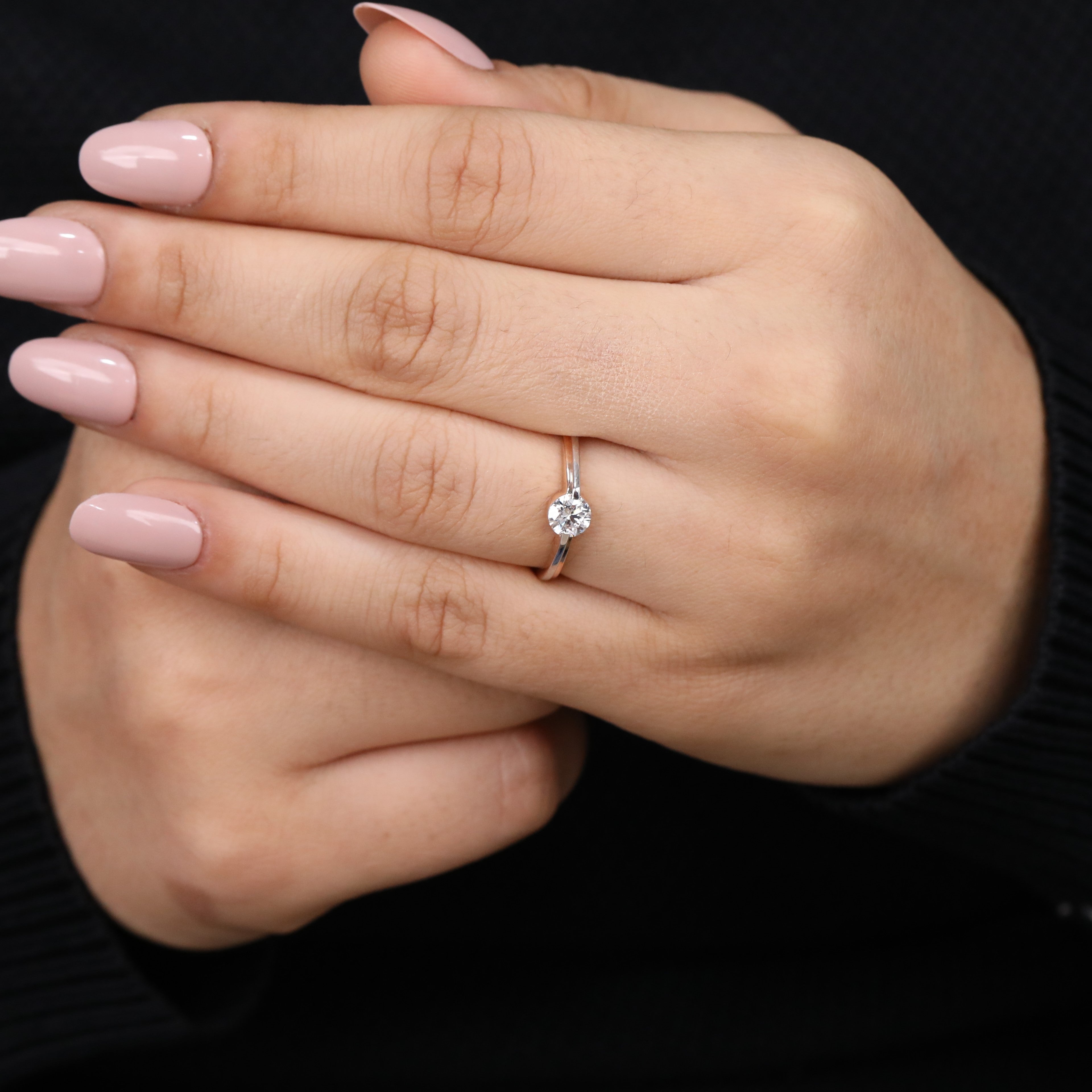 Minimalist lab grown diamond ring with a chic two tone modern band