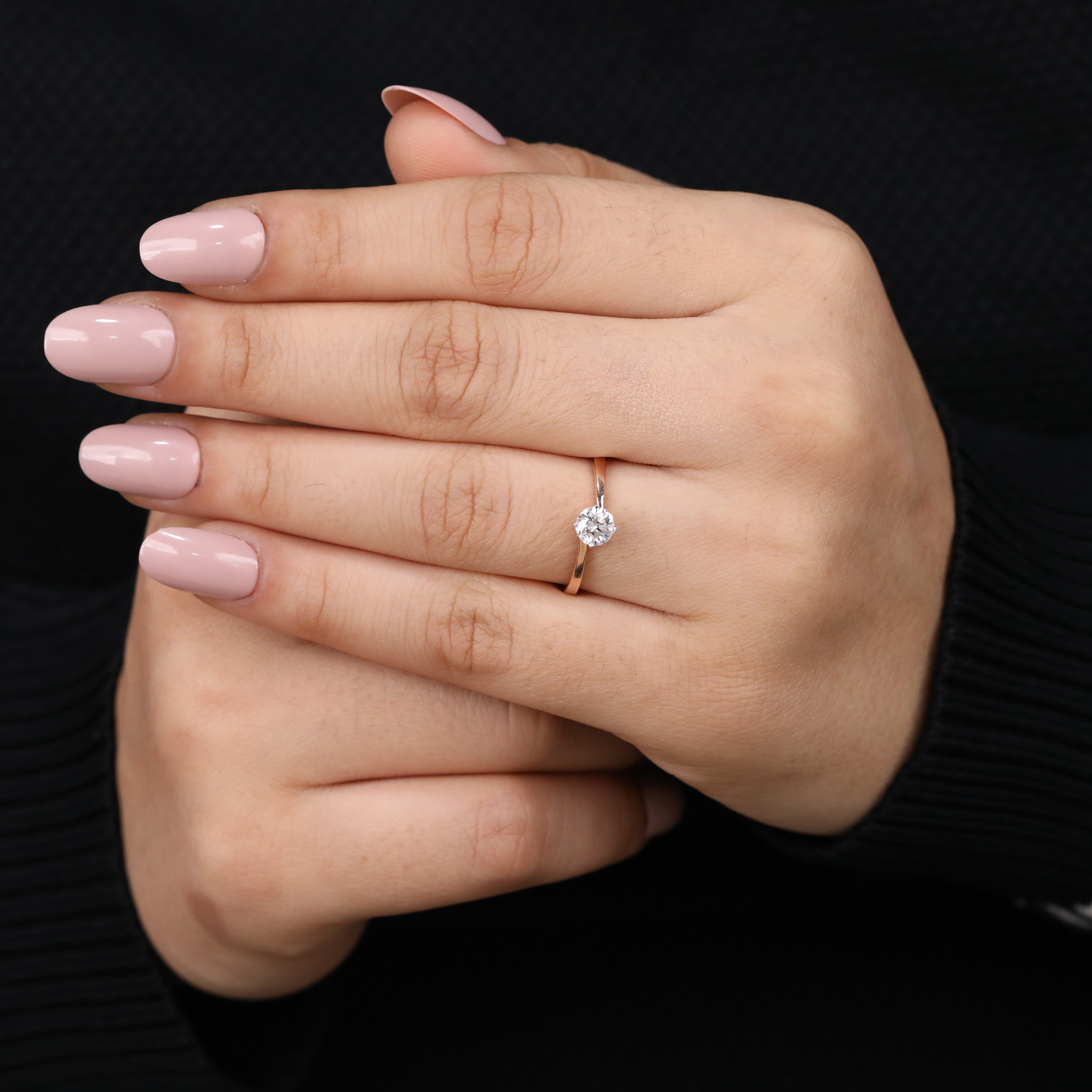 Beautiful ring featuring a bright round lab grown diamond in solitaire setting