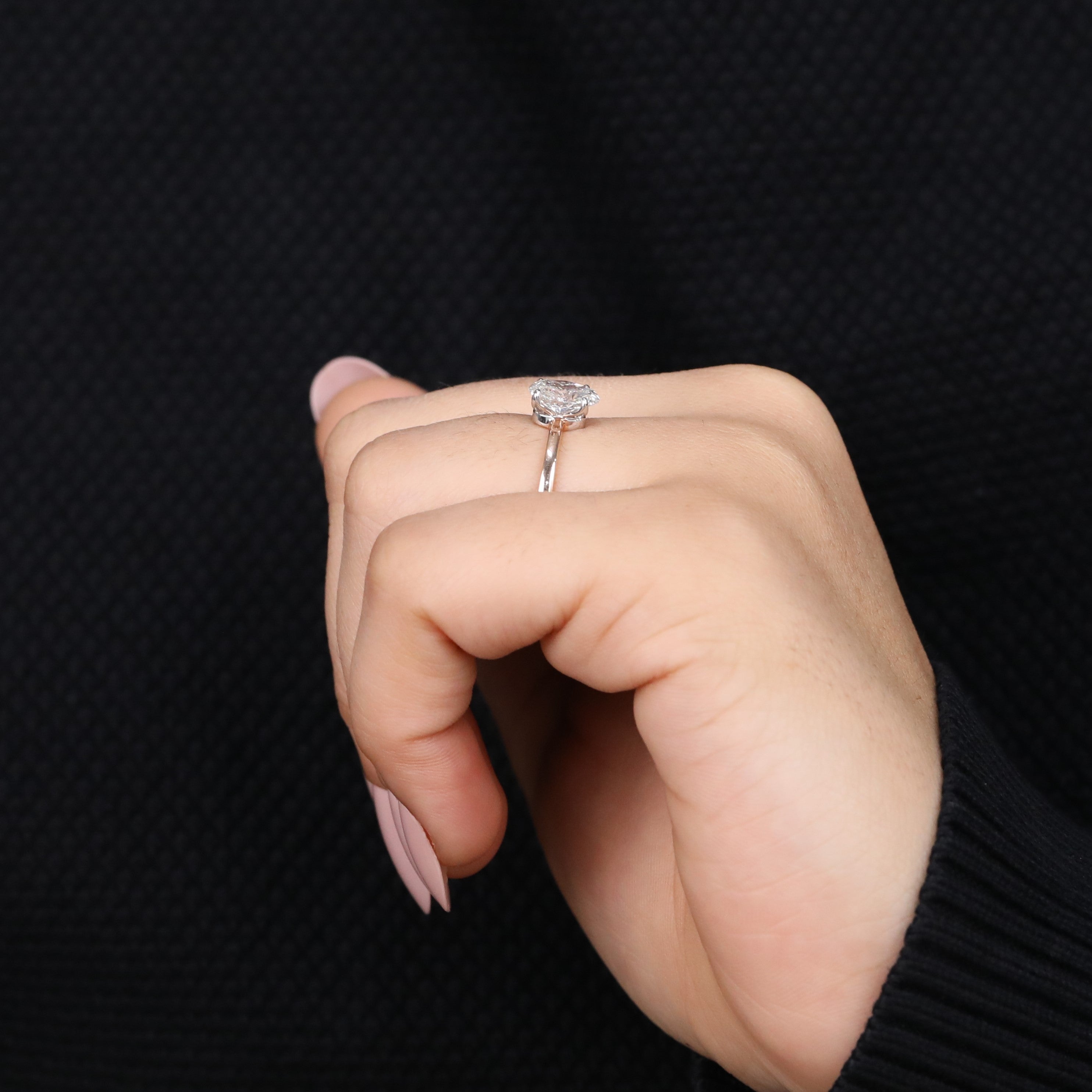 Modern oval lab grown diamond ring offering elegant simplicity and shine