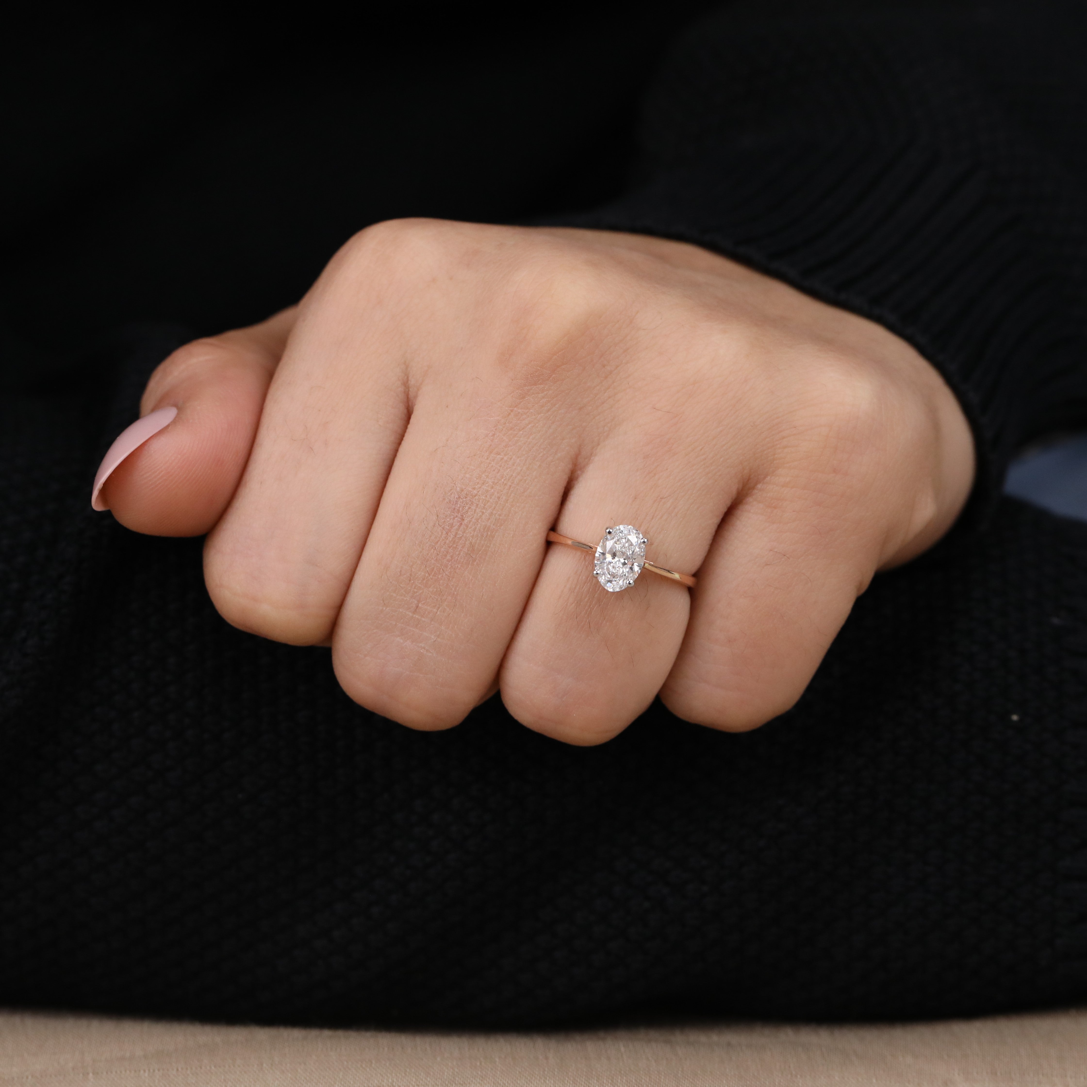 Oval lab grown diamond ring designed with a delicate, elegant solitaire band.