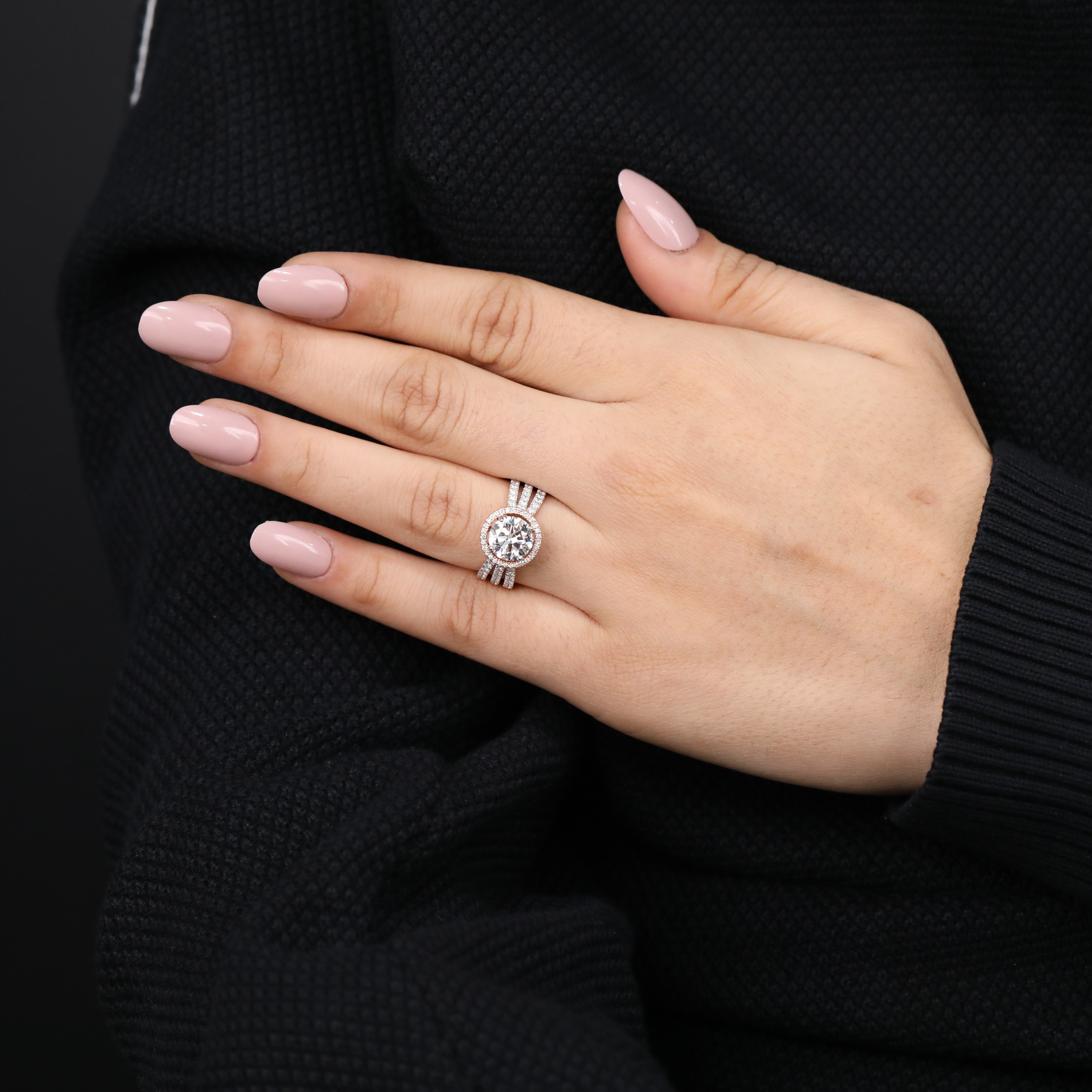 Statement halo ring featuring a radiant round lab grown diamond centerpiece