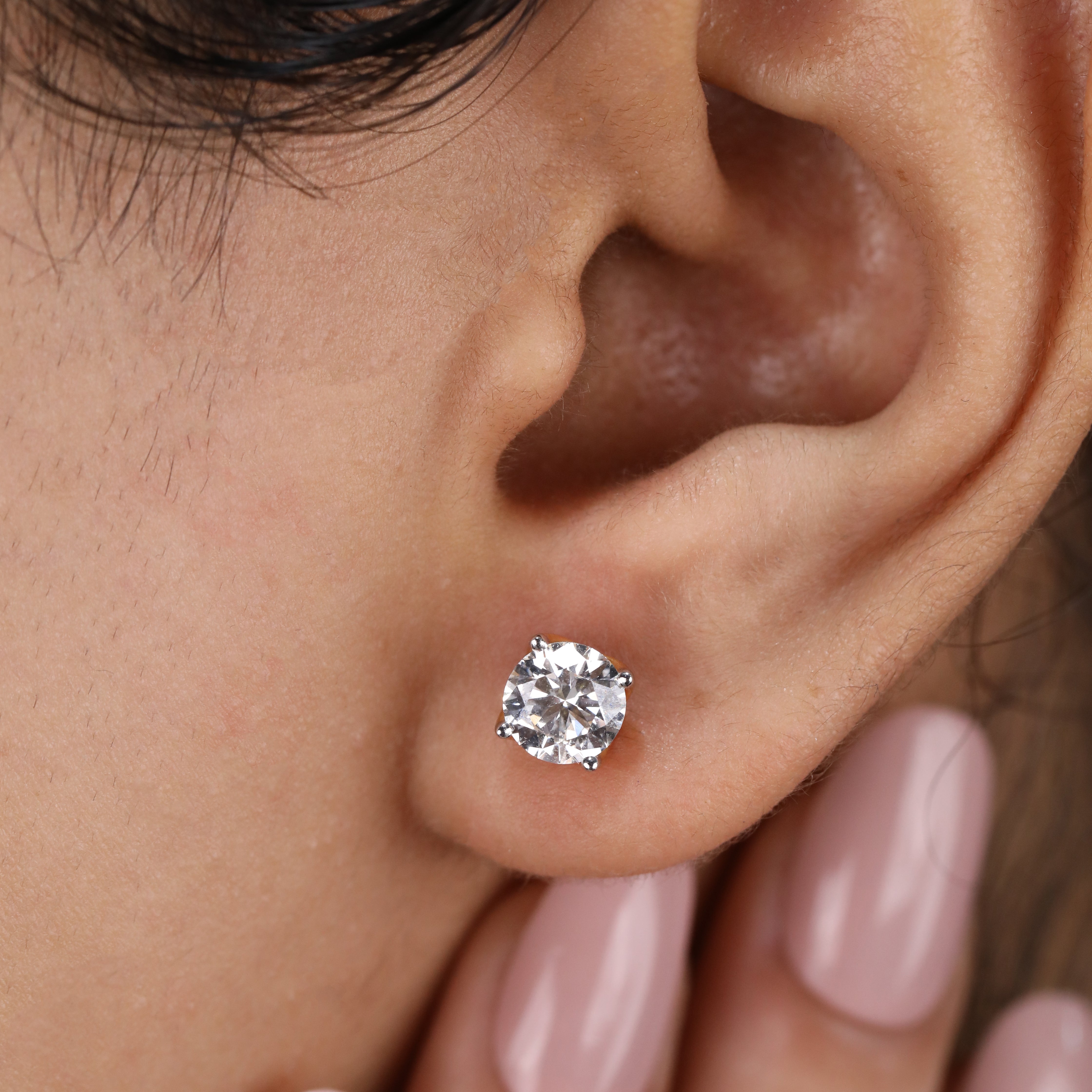 Beautiful round cut diamond studs perfect for festive gifting or weddings.
