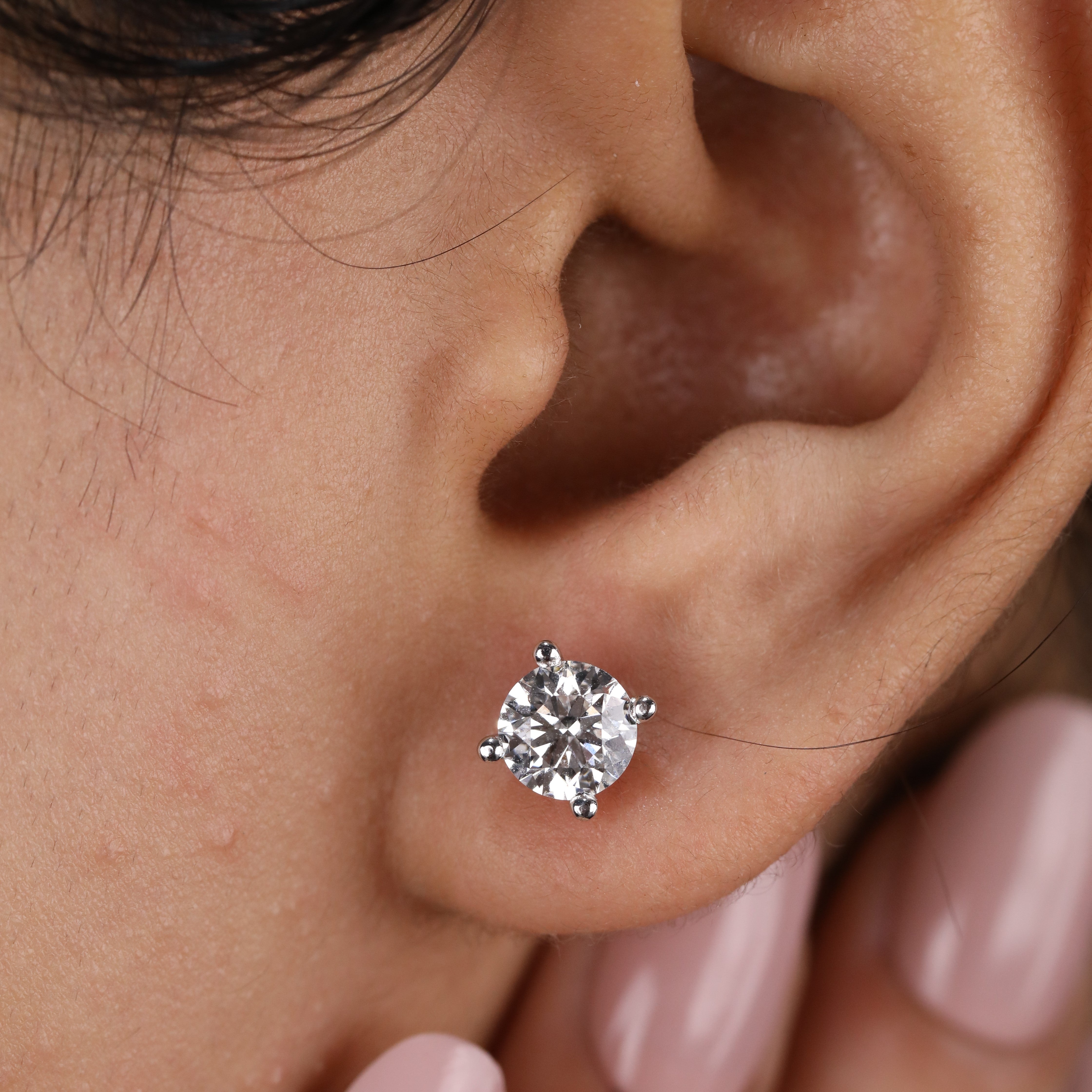 Elegant round lab diamond earrings designed with a lightweight prong frame