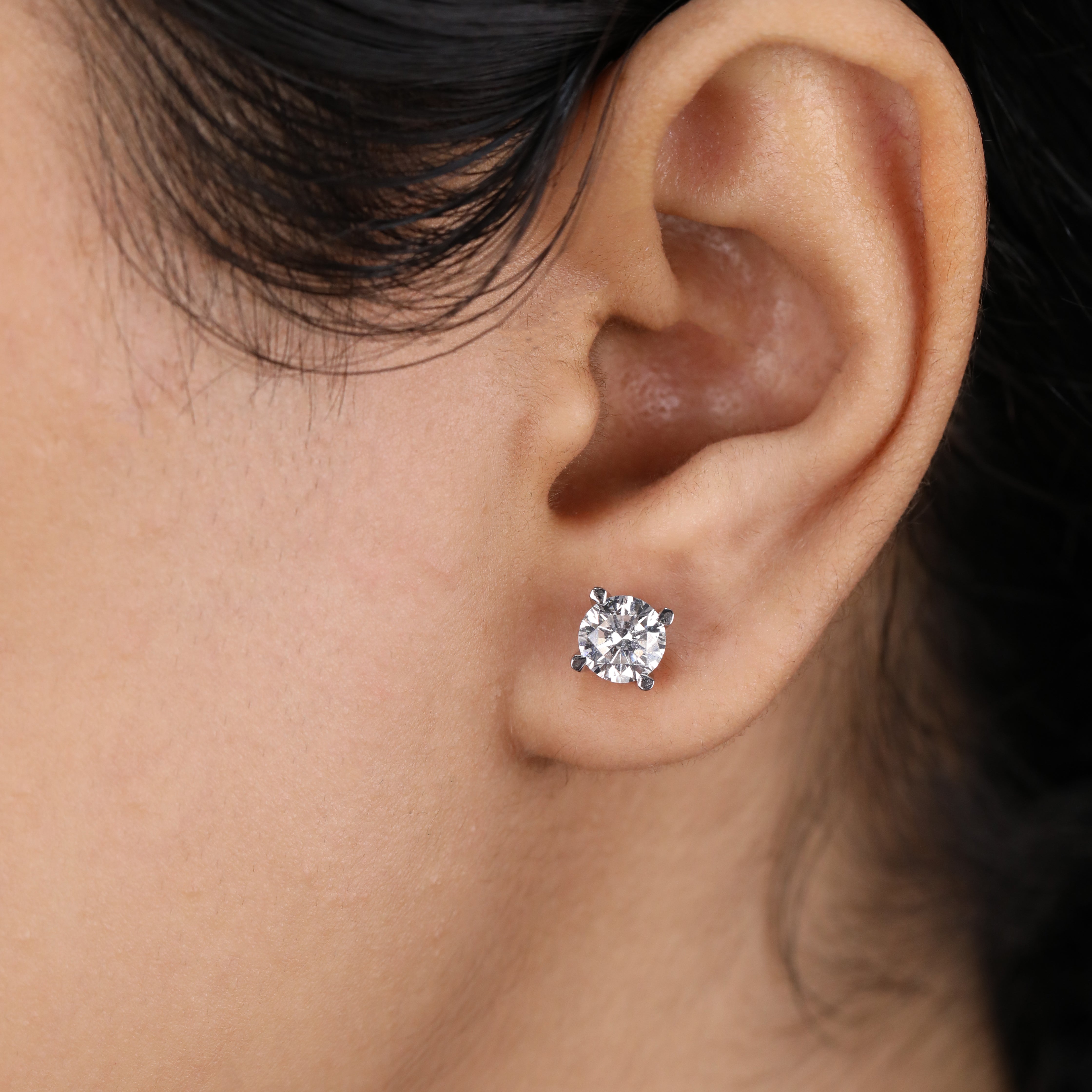 Timeless round diamond earrings perfect for holiday gifting and classy occasions