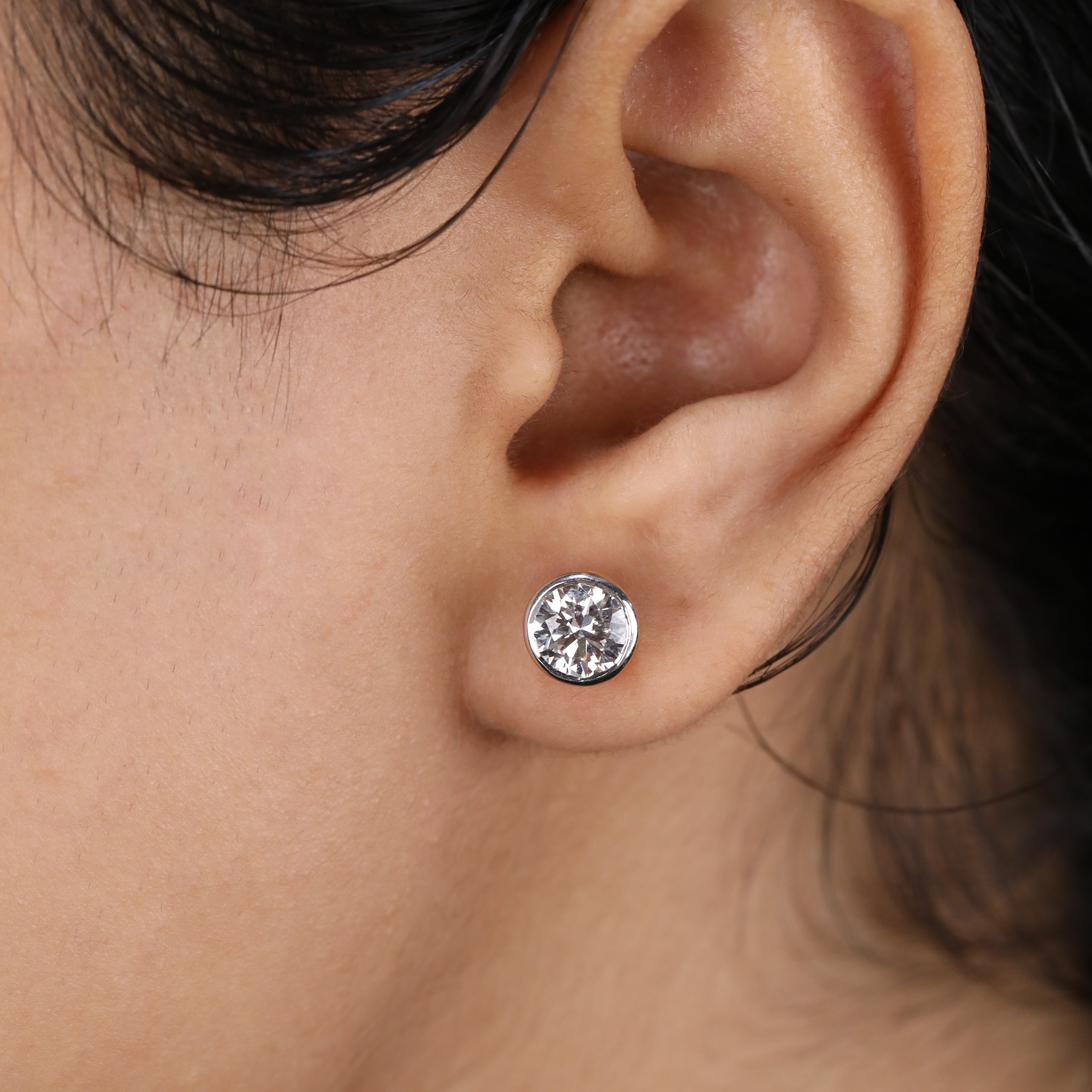 Round bezel set lab diamond studs great for holiday gifting occasions
