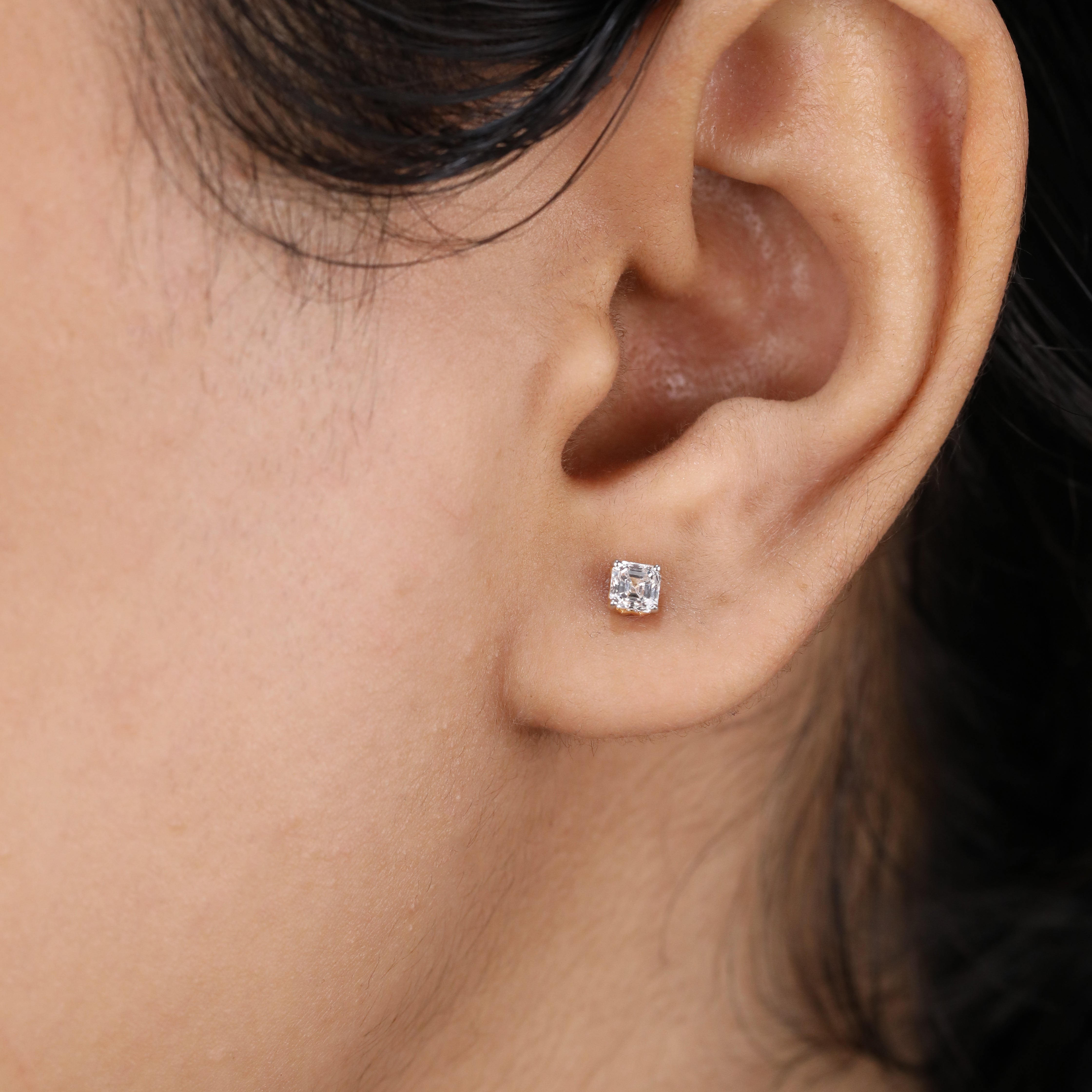 Stylish Asscher cut diamond stud earrings ideal for party wear and celebrations