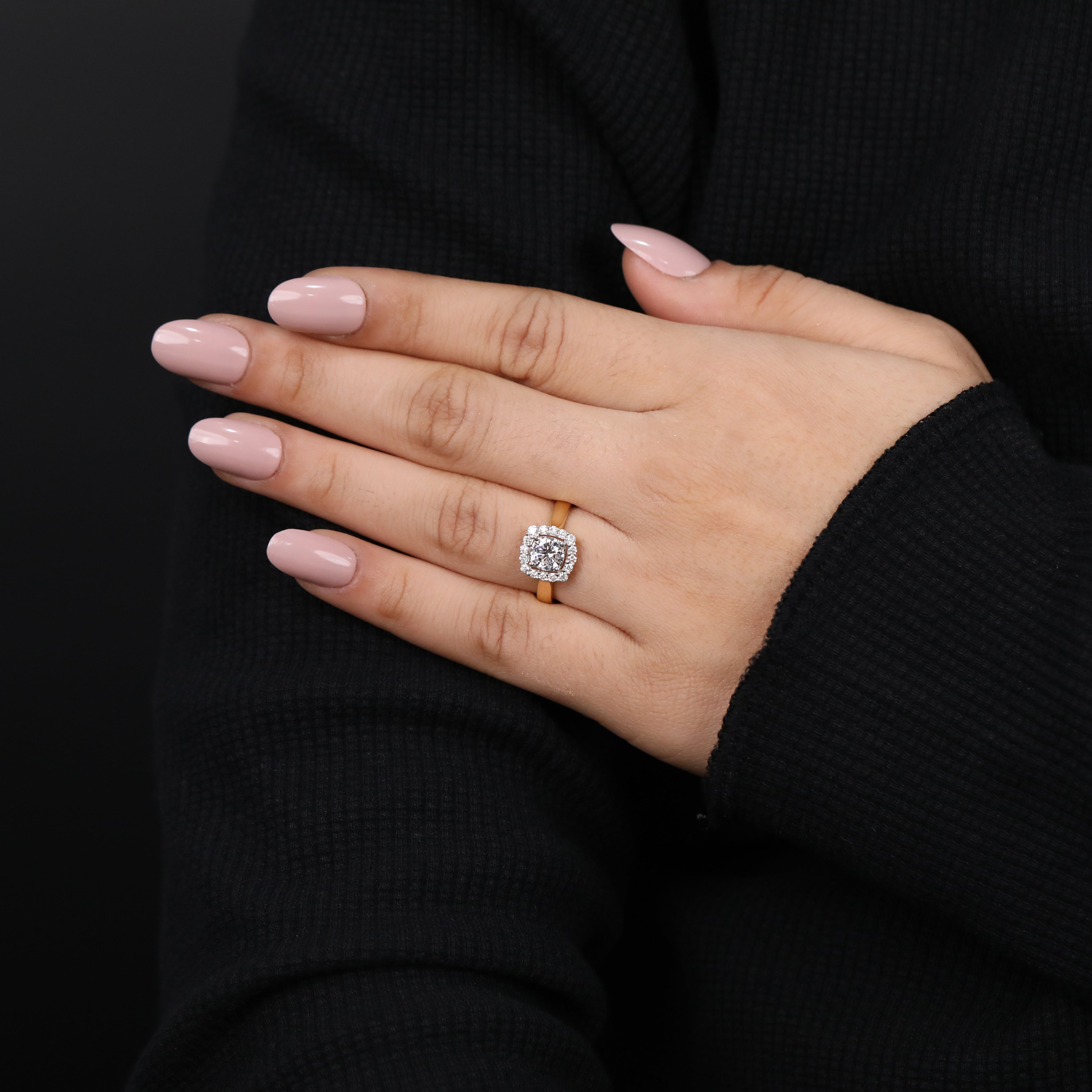Classic halo ring showcasing a round cut lab grown diamond