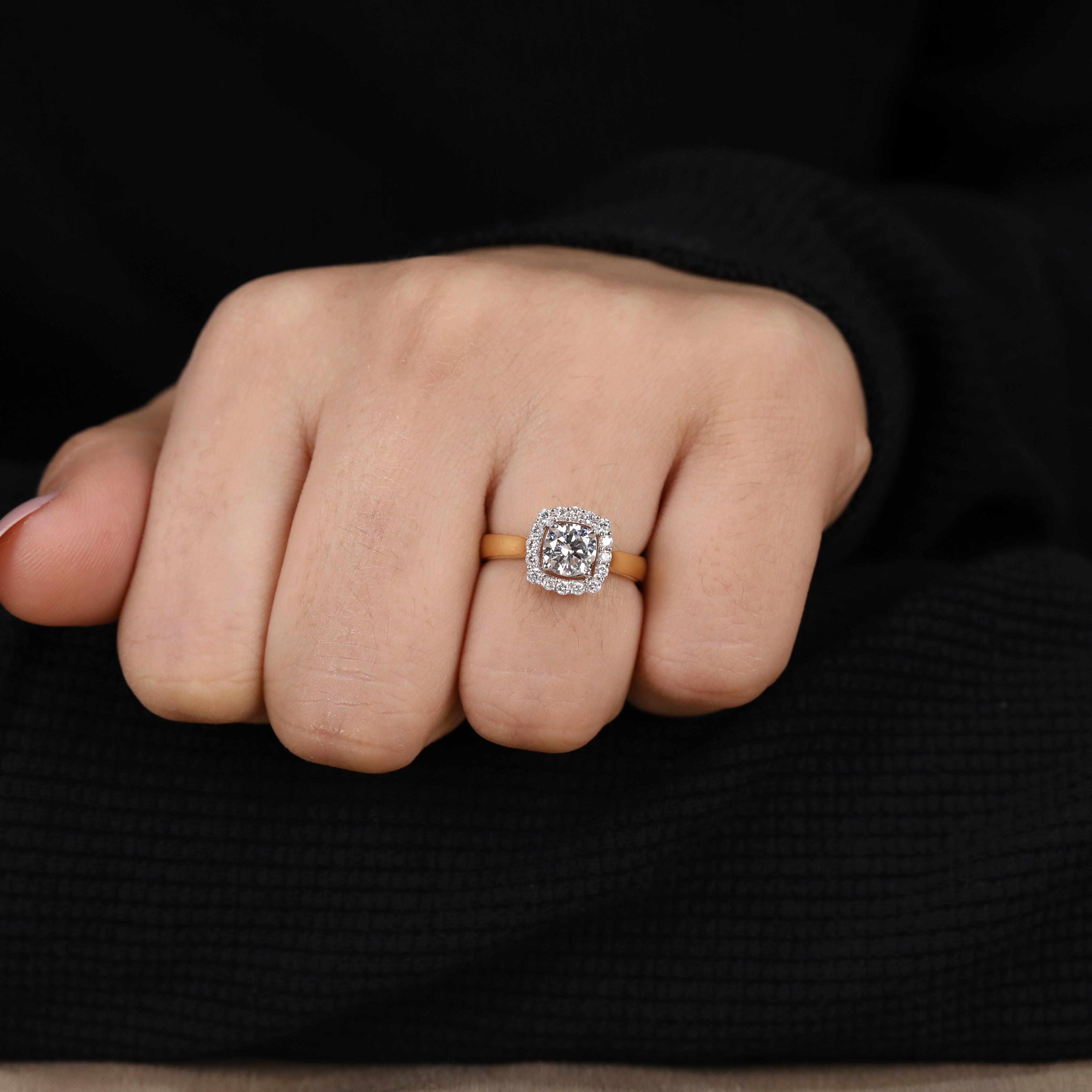 Stunning round lab diamond ring surrounded by a halo of accent stones