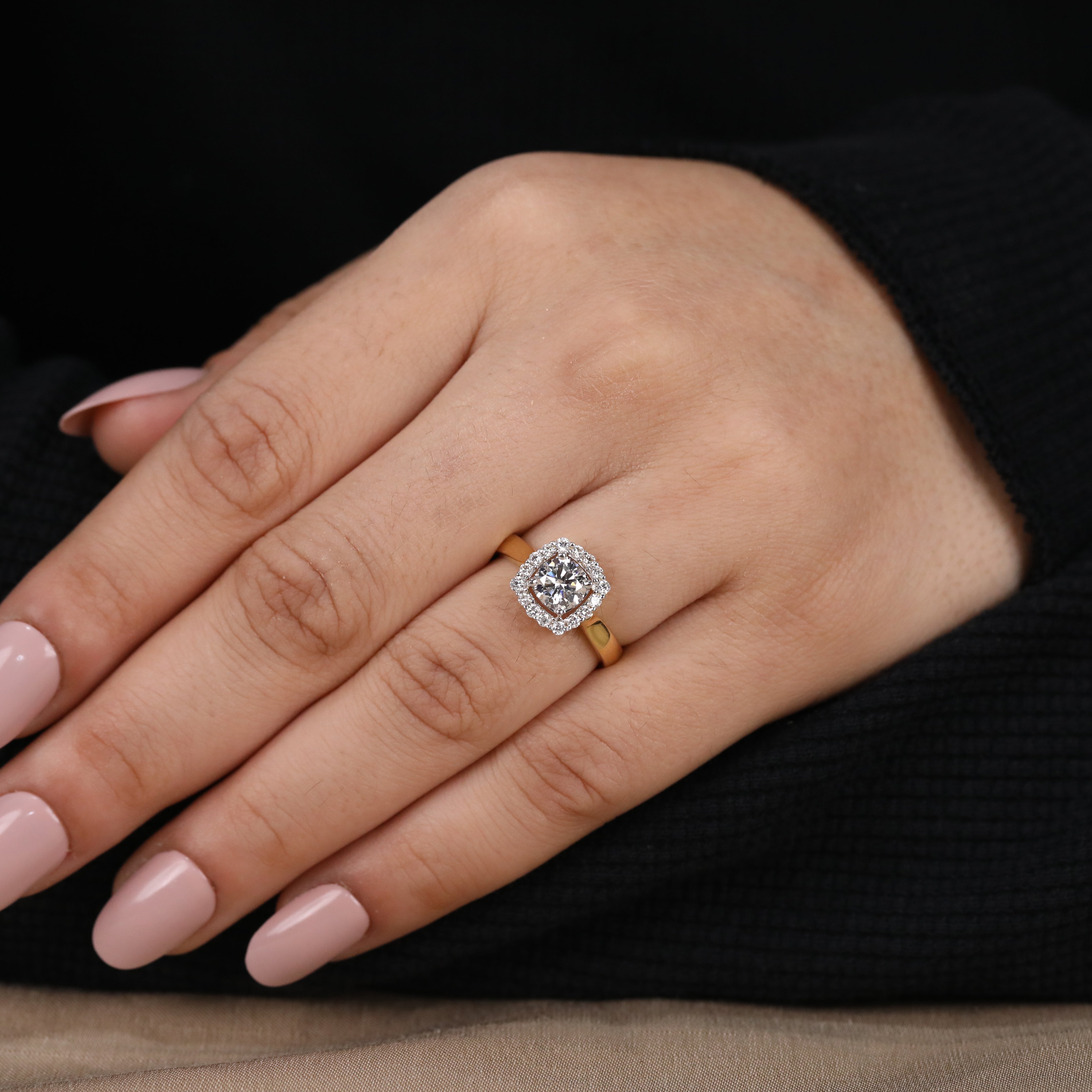 Brilliant round lab grown diamond enhanced by a shimmering halo setting