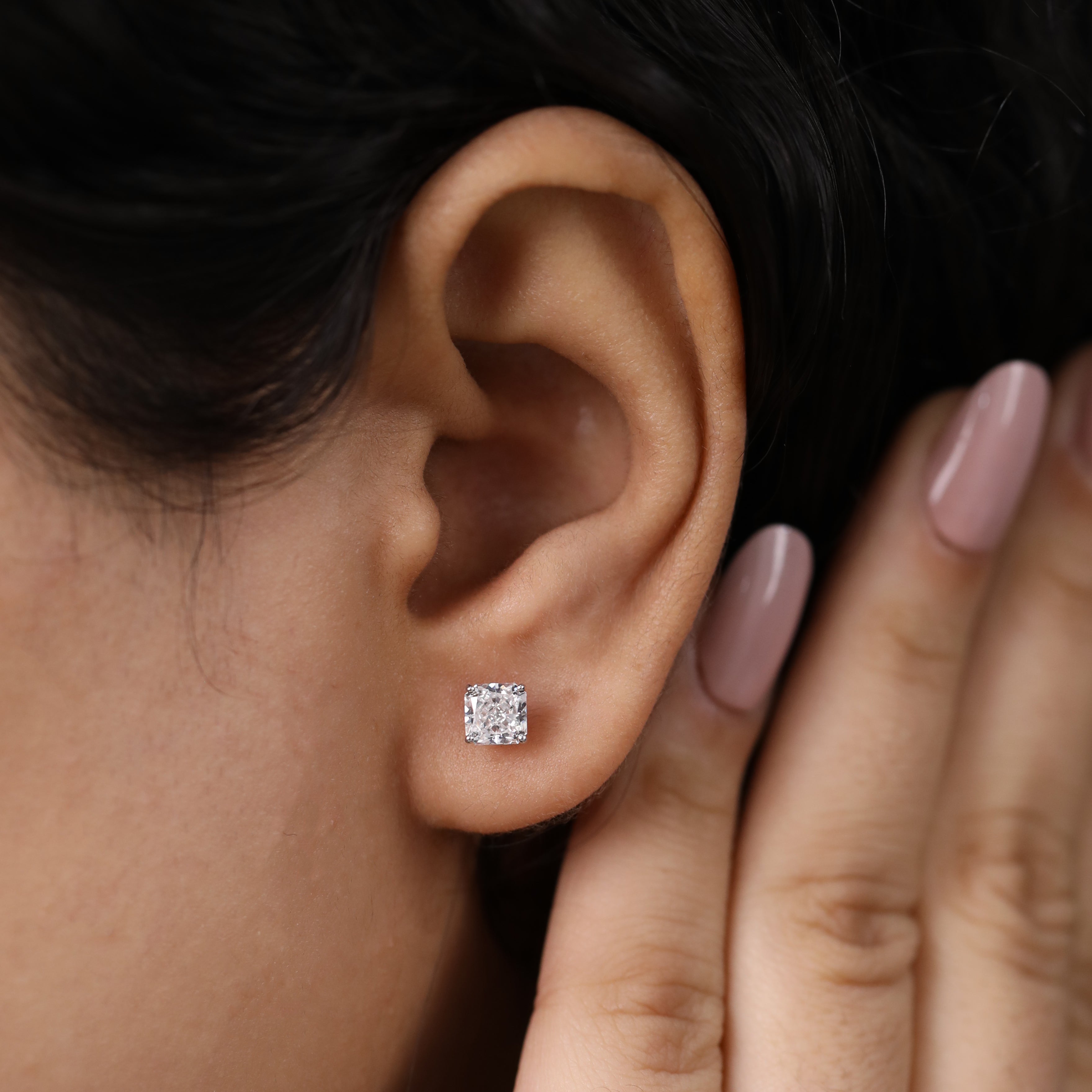 Chic cushion diamond studs crafted for everyday elegance and special events.