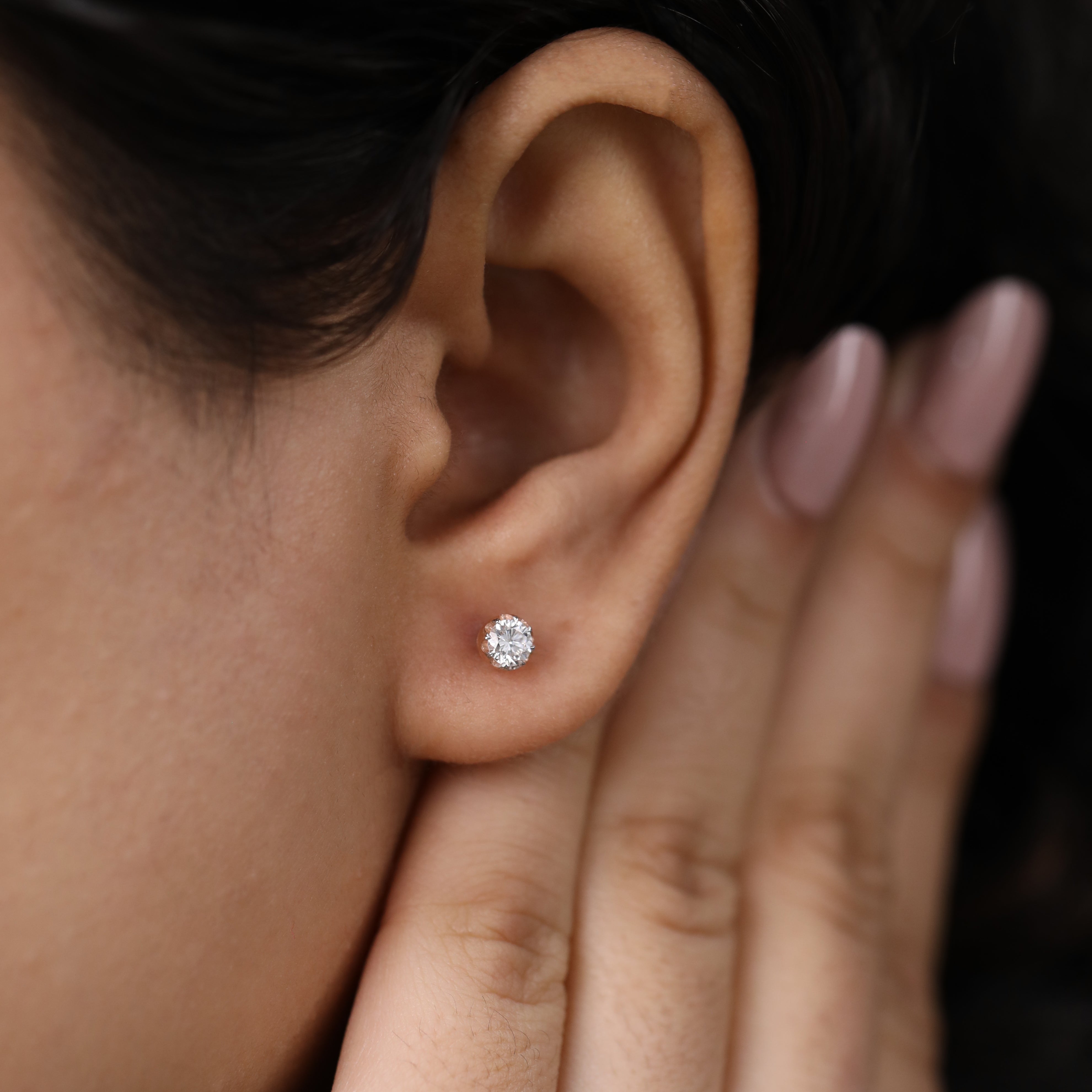 Minimal round diamond earrings crafted for festive occasions and birthdays.