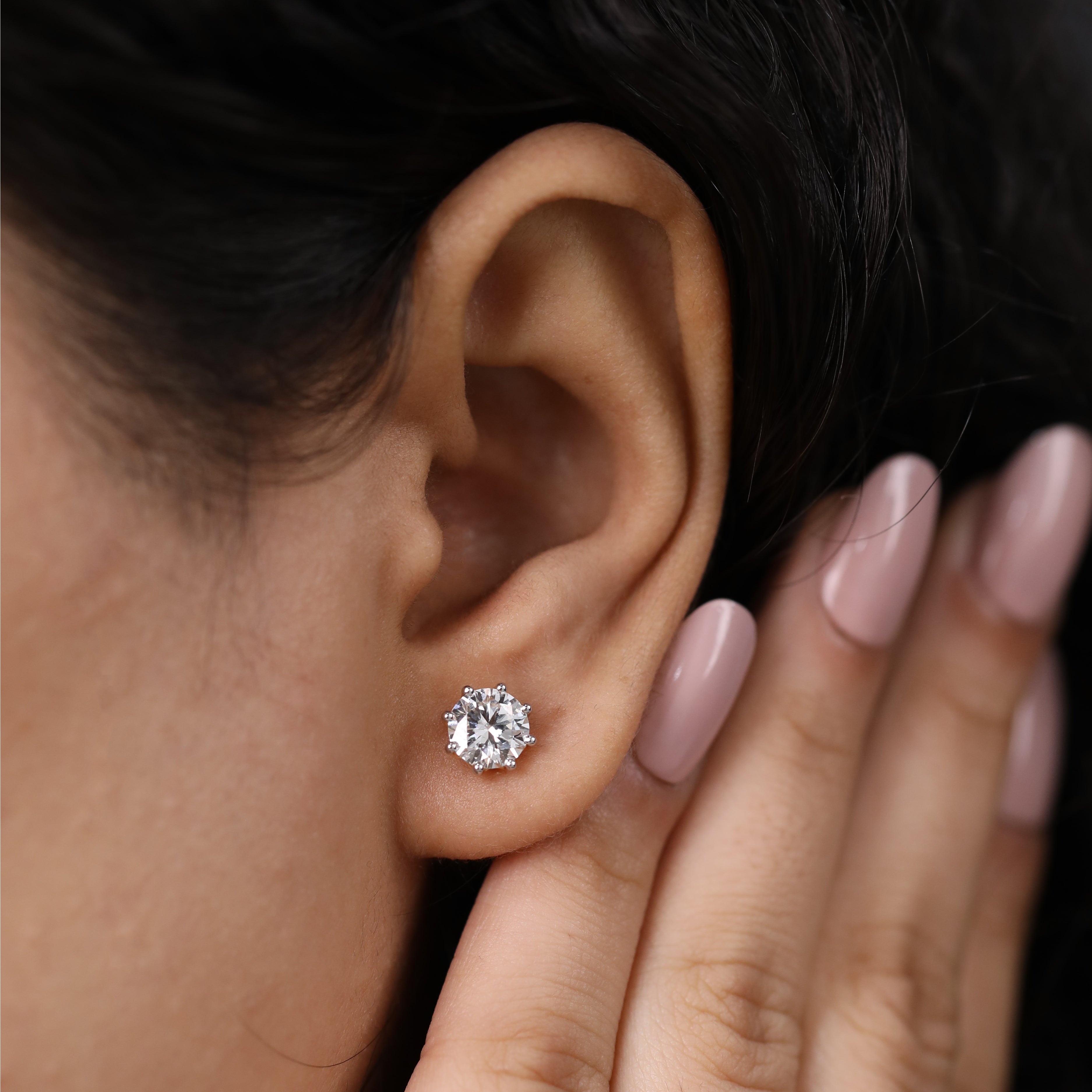 Beautiful solitaire diamond studs perfect for engagement gifting or festive wear.