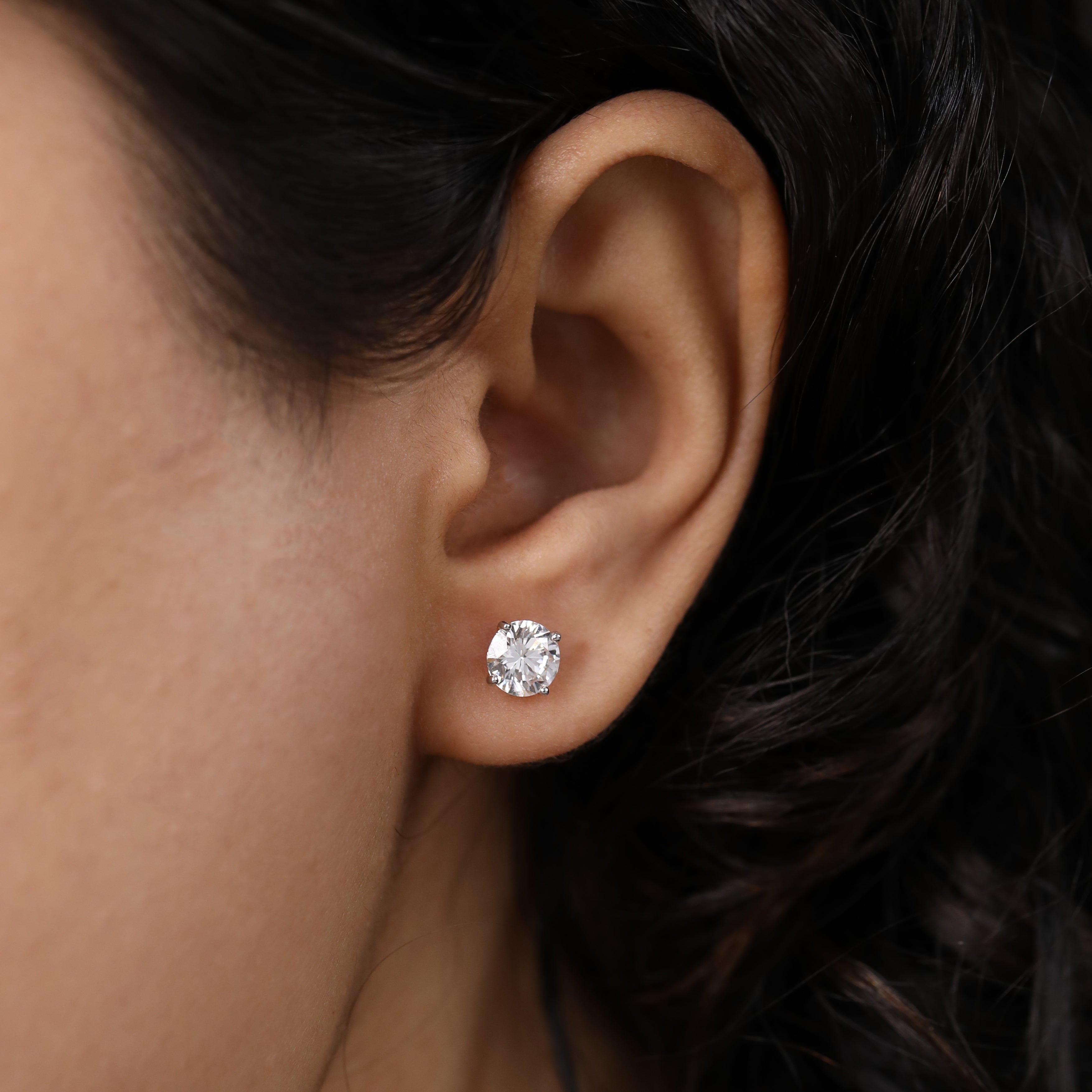 Beautiful solitaire diamond studs perfect for engagement moments.