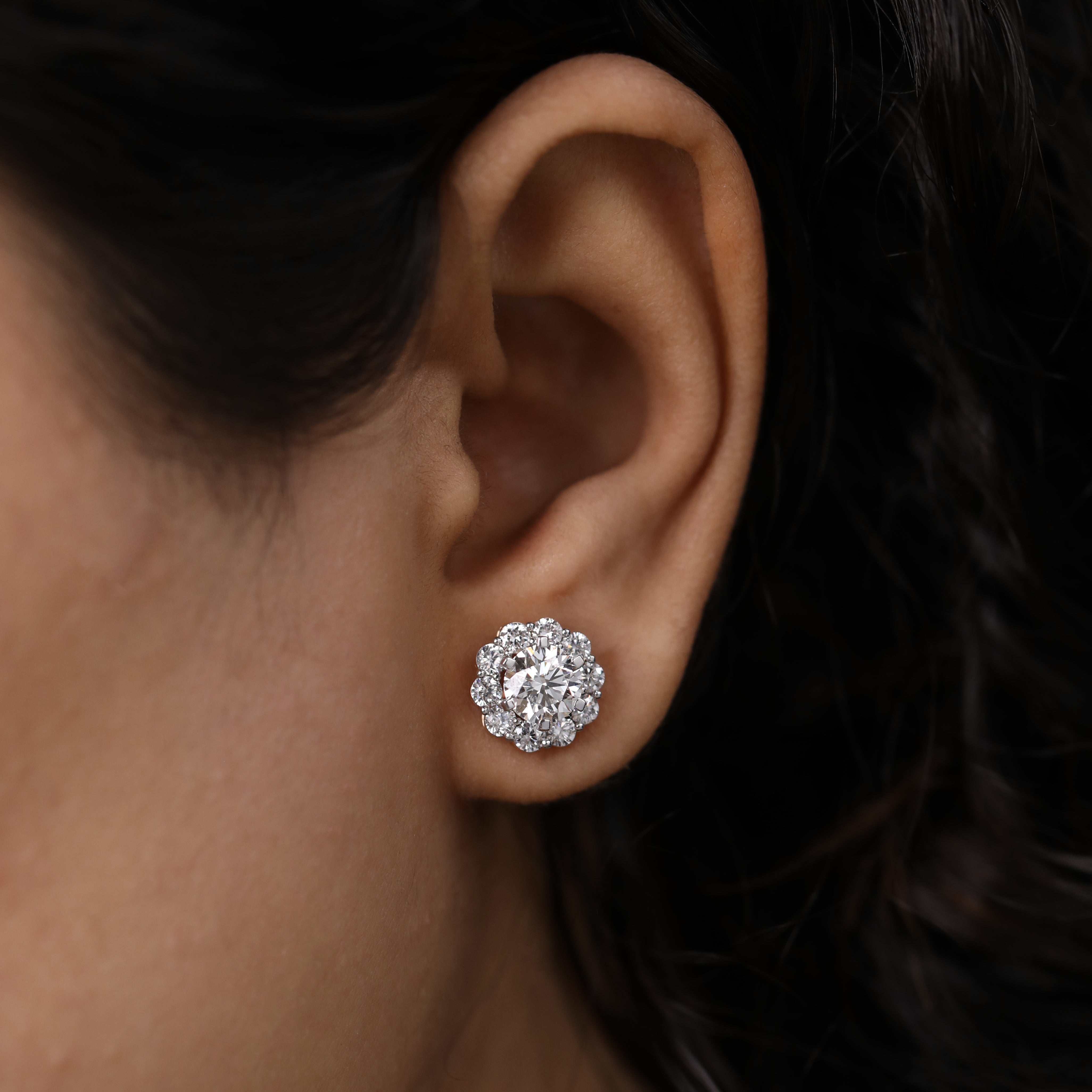 Brilliant floral halo round diamond earrings perfect for festive gifting.