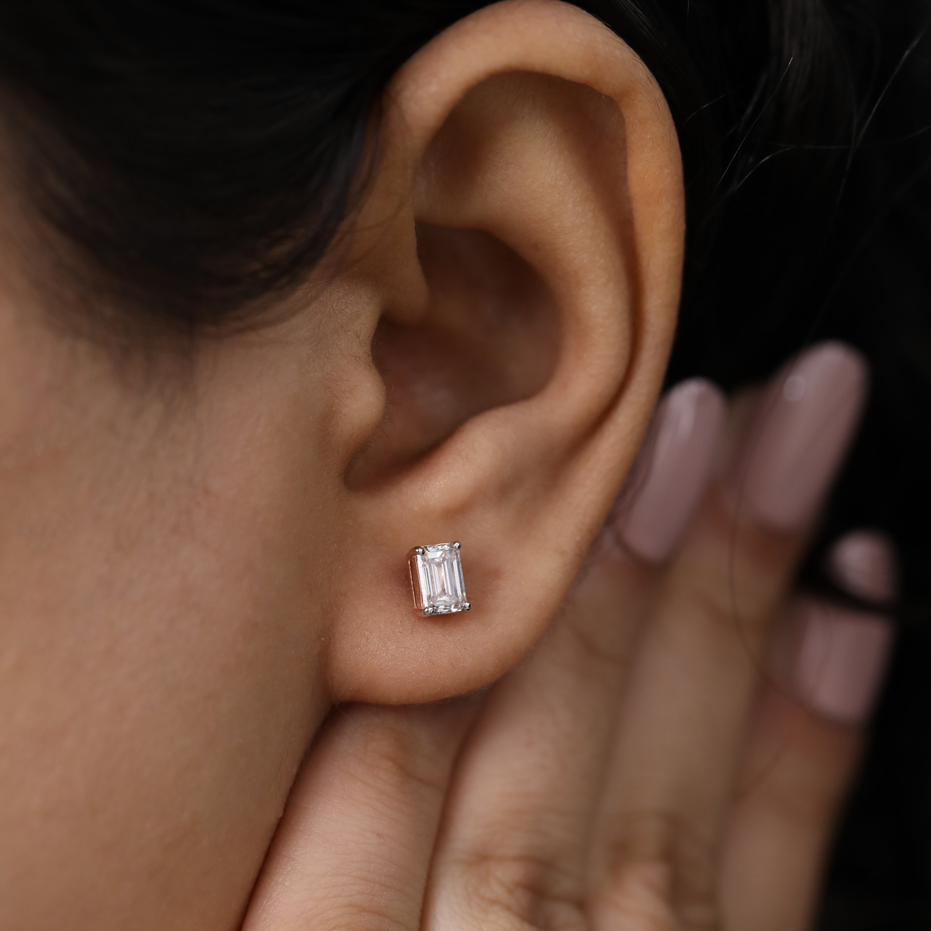 Stylish emerald-cut diamond earrings ideal for anniversary and celebration moments.