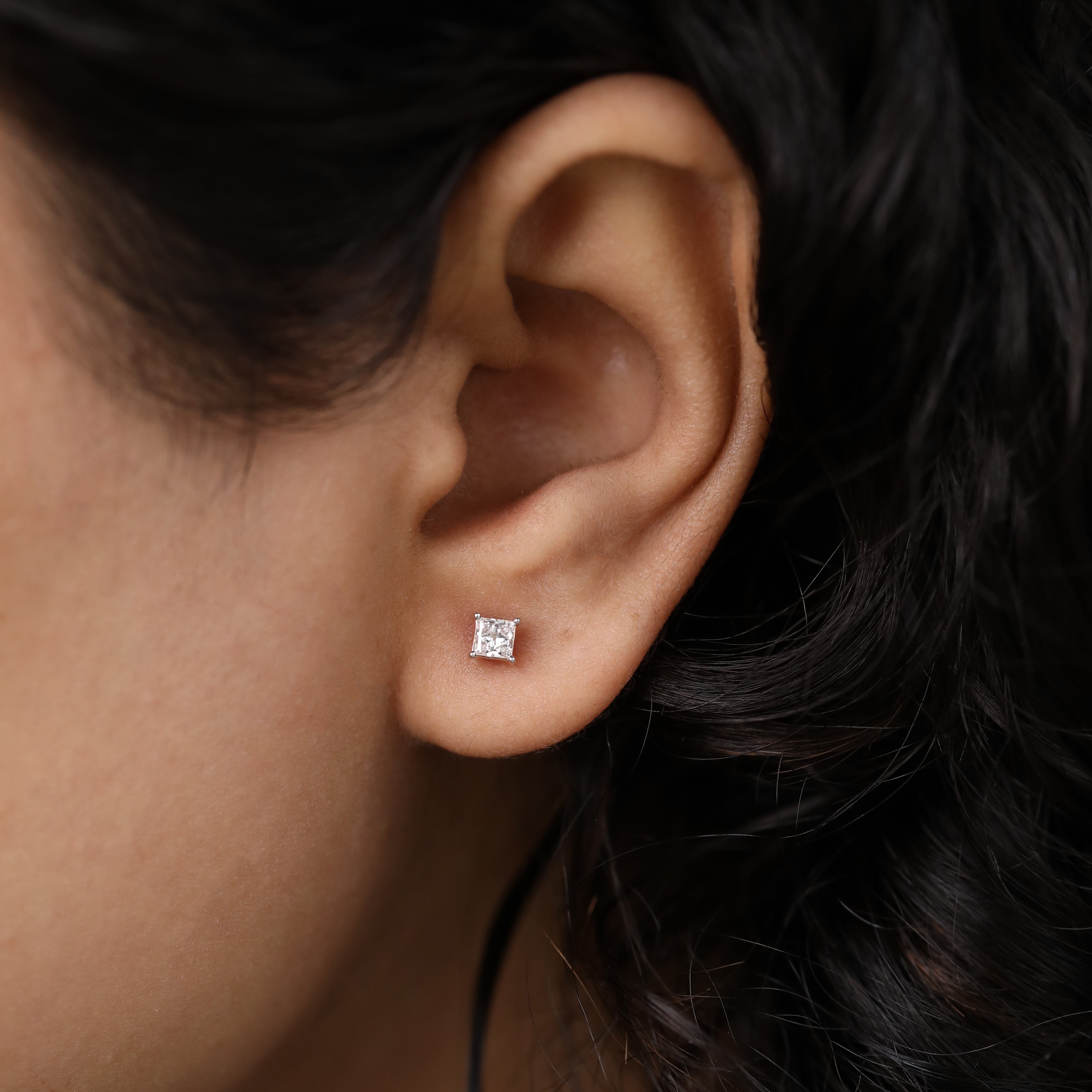 Timeless princess-cut diamond earrings ideal for festive and gifting moments.