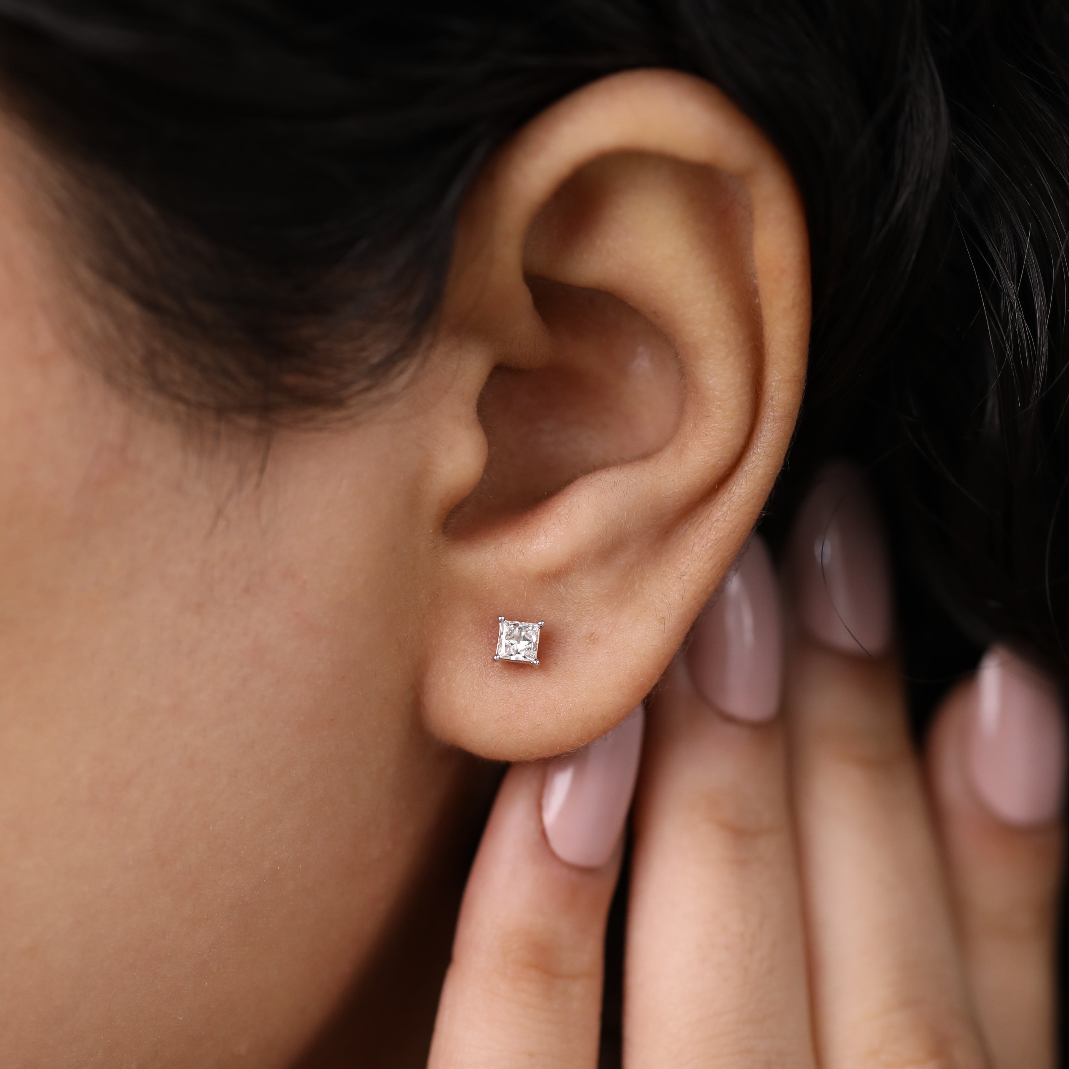 Brilliant princess-cut diamond stud earrings perfect for wedding celebrations.