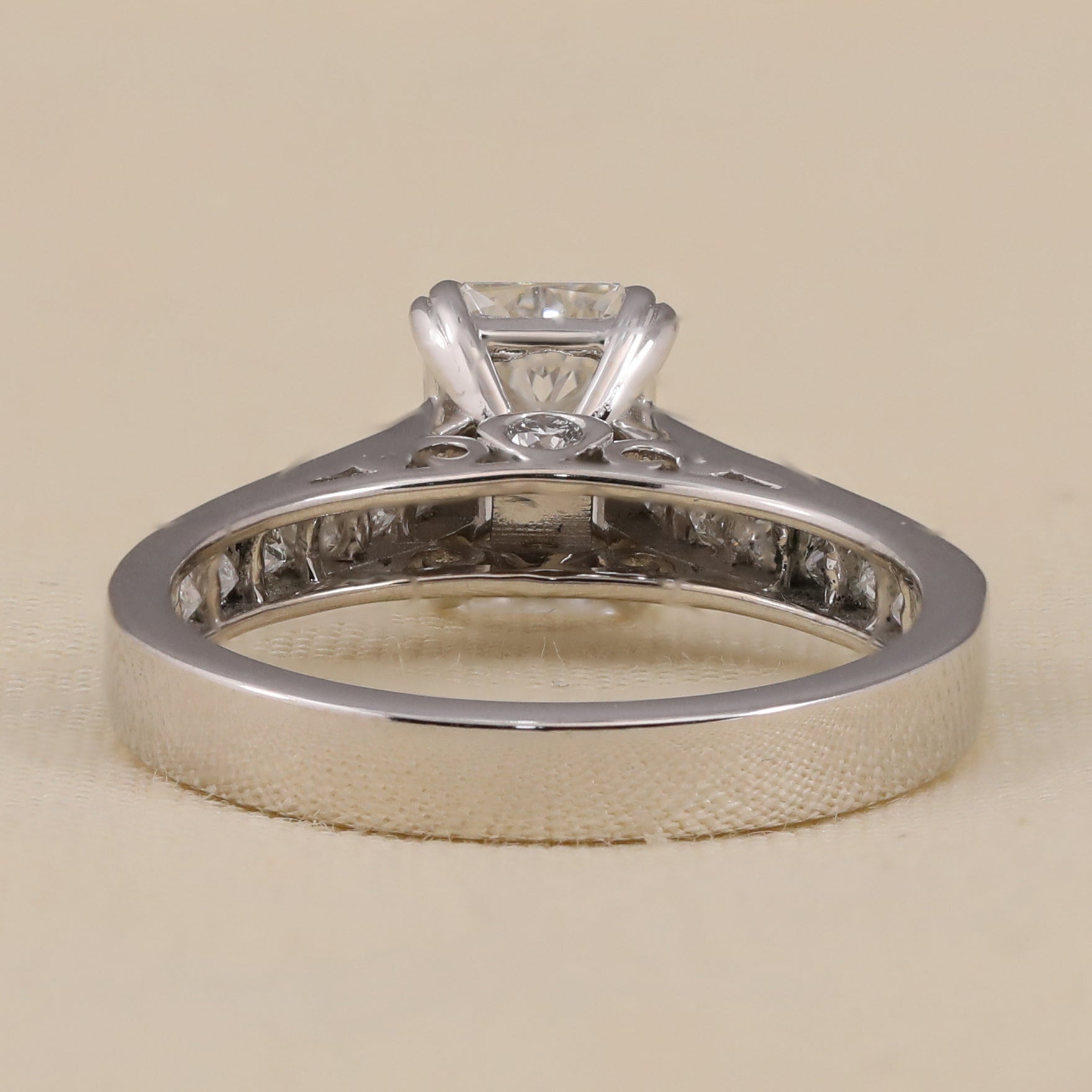 Vintage inspired radiant cut lab diamond ring with refined side detailing.