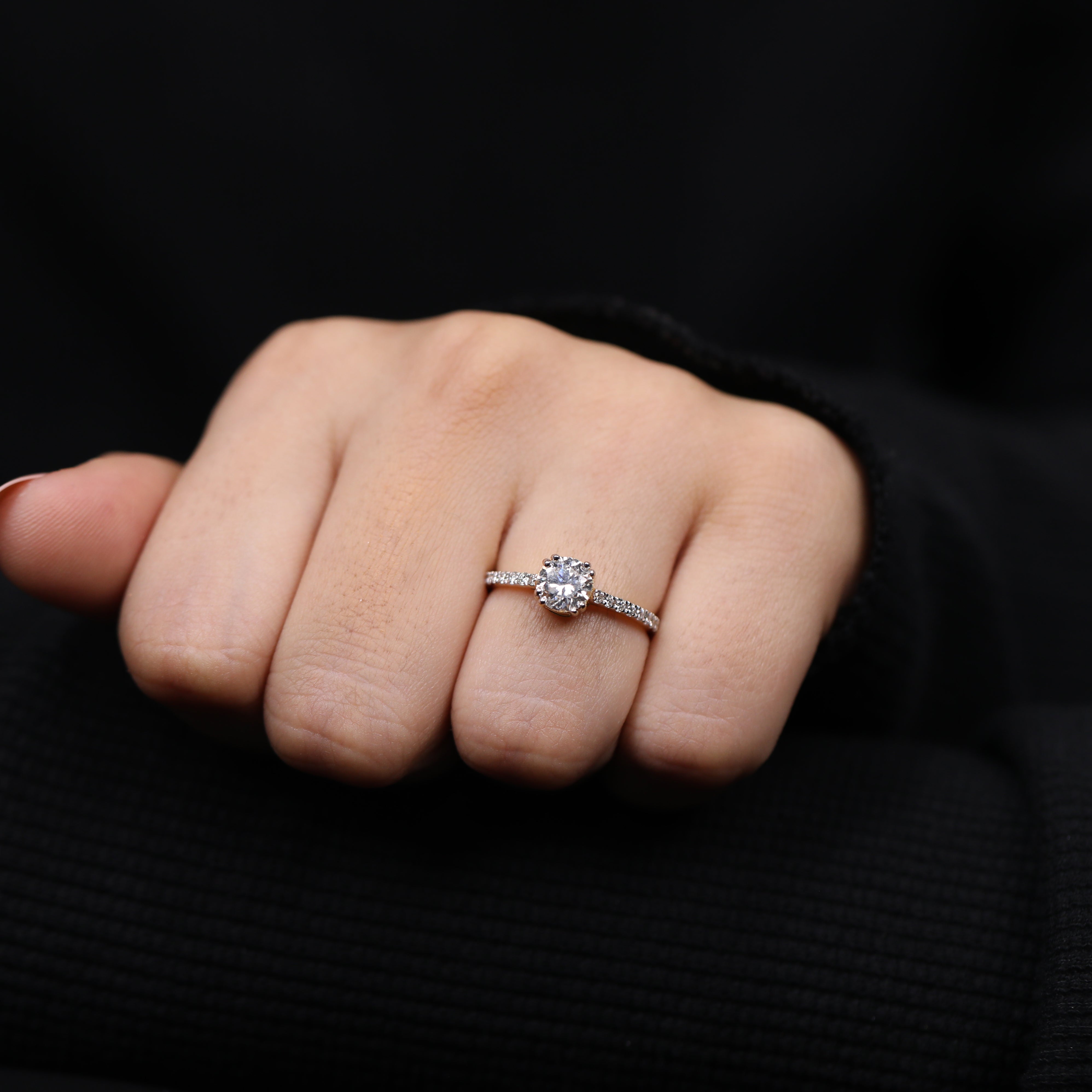 Vow renewal ring highlighting round lab created diamond