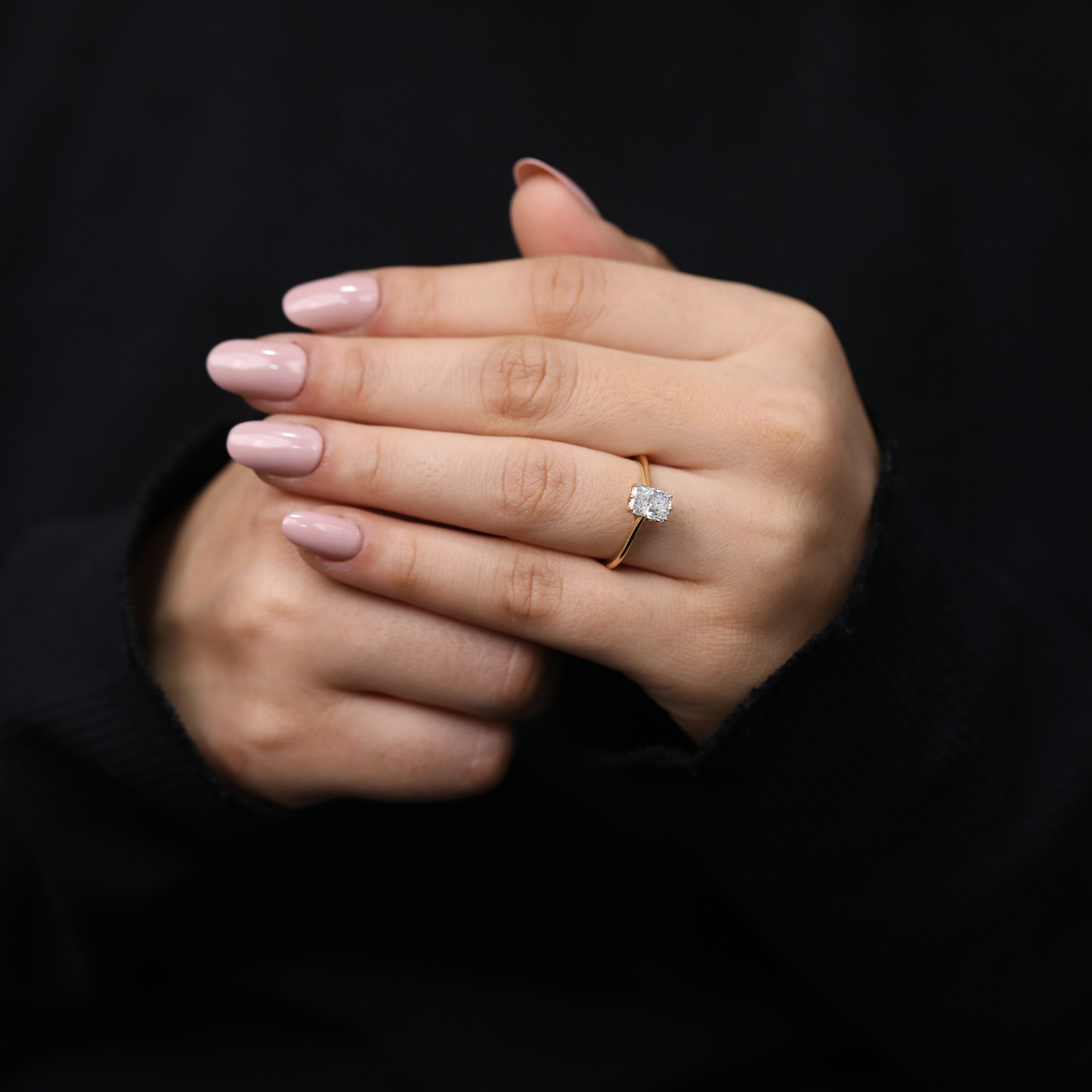 Elegant solitaire engagement ring with radiant lab created diamond