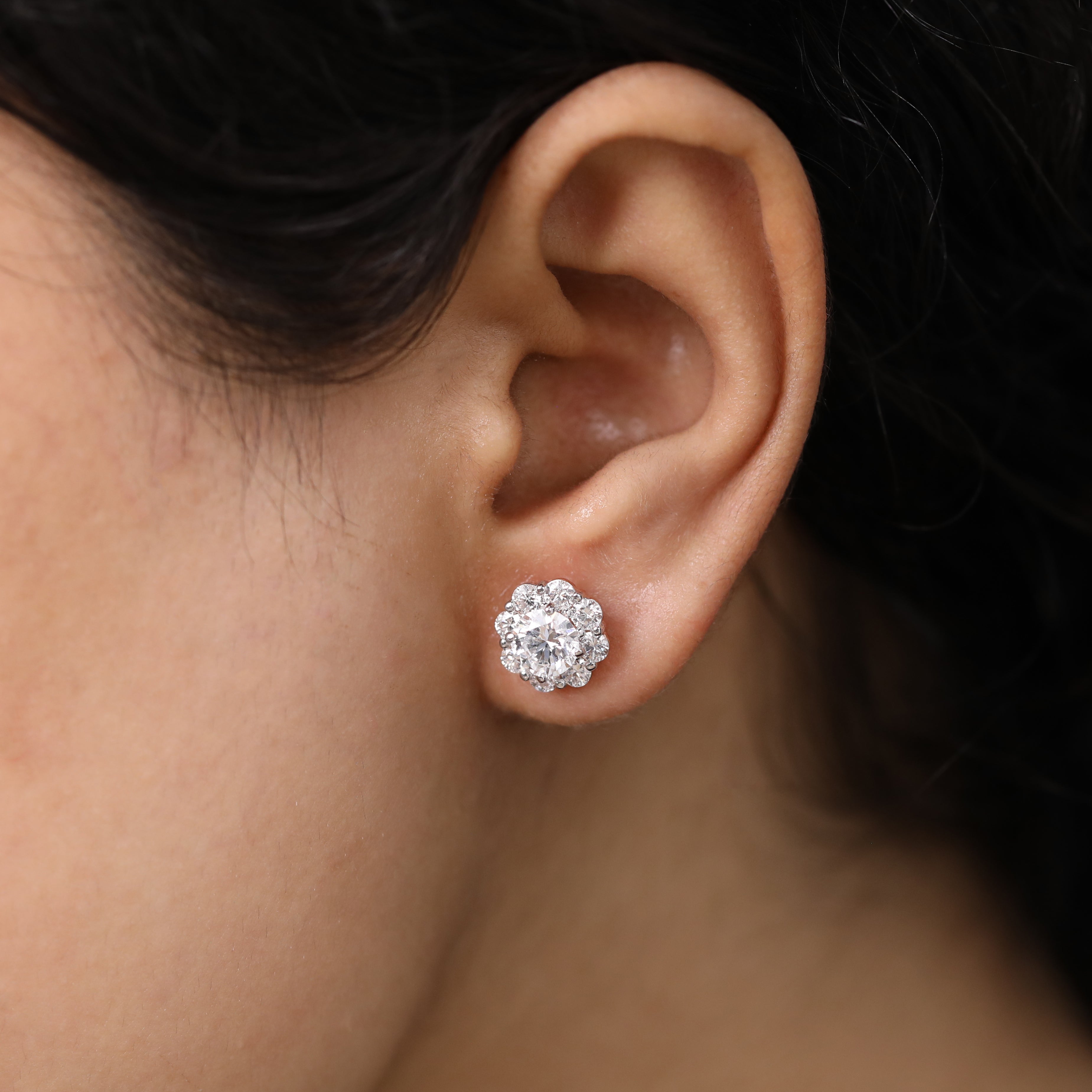 Timeless round halo diamond earrings great for sentimental birthday gifting