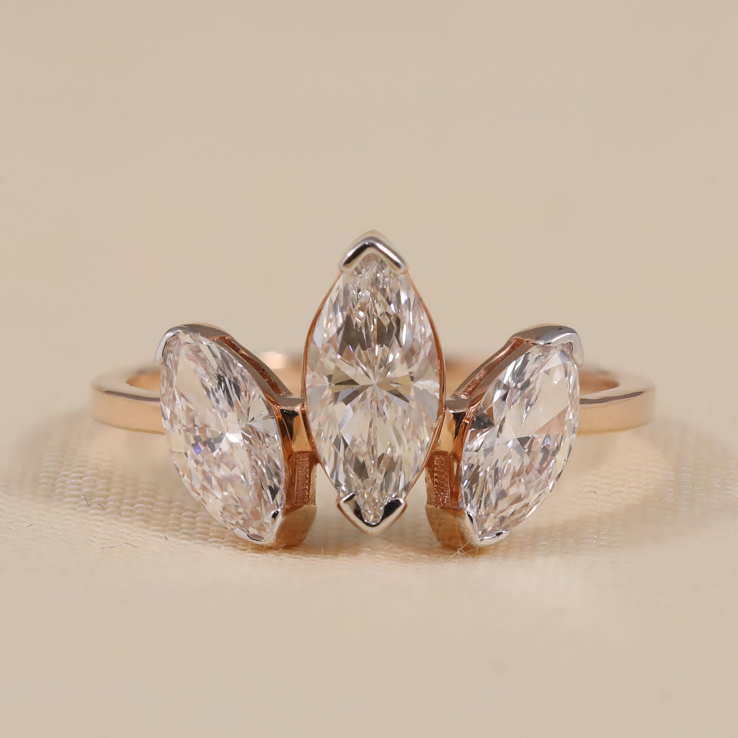 Marquise lab grown diamond three stone engagement ring